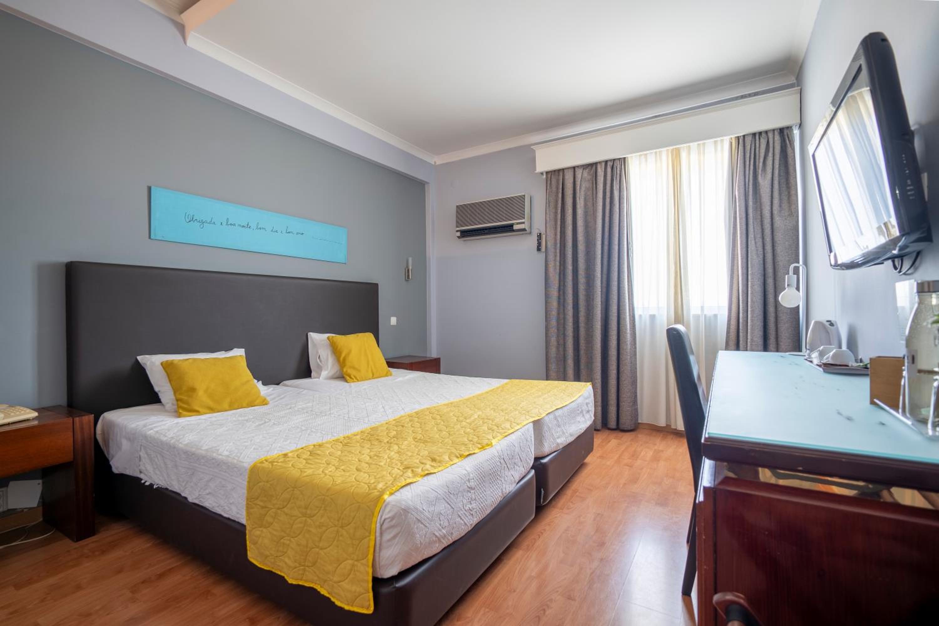 Twin Room - Photo 1