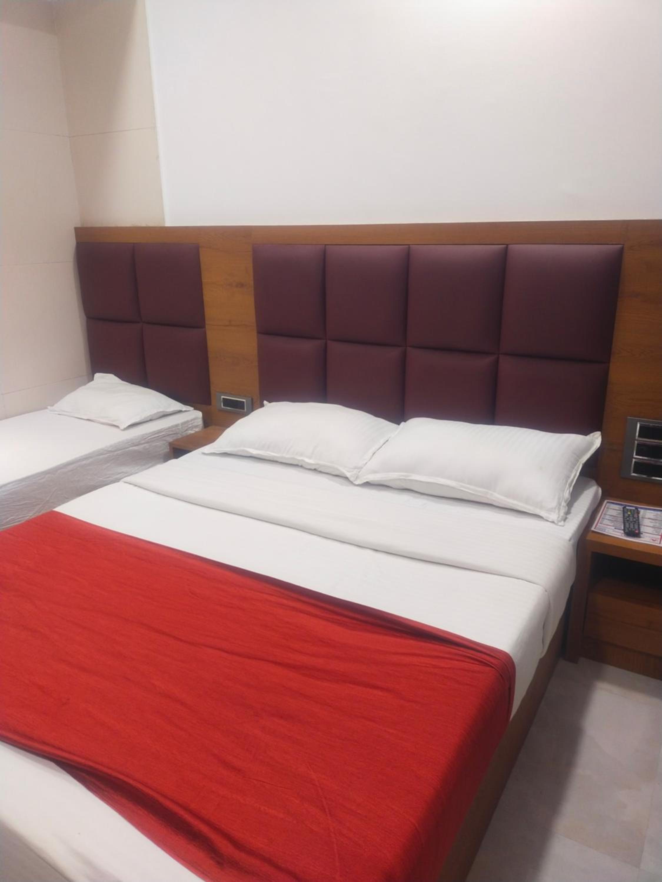 Deluxe Quadruple Room - Photo 17