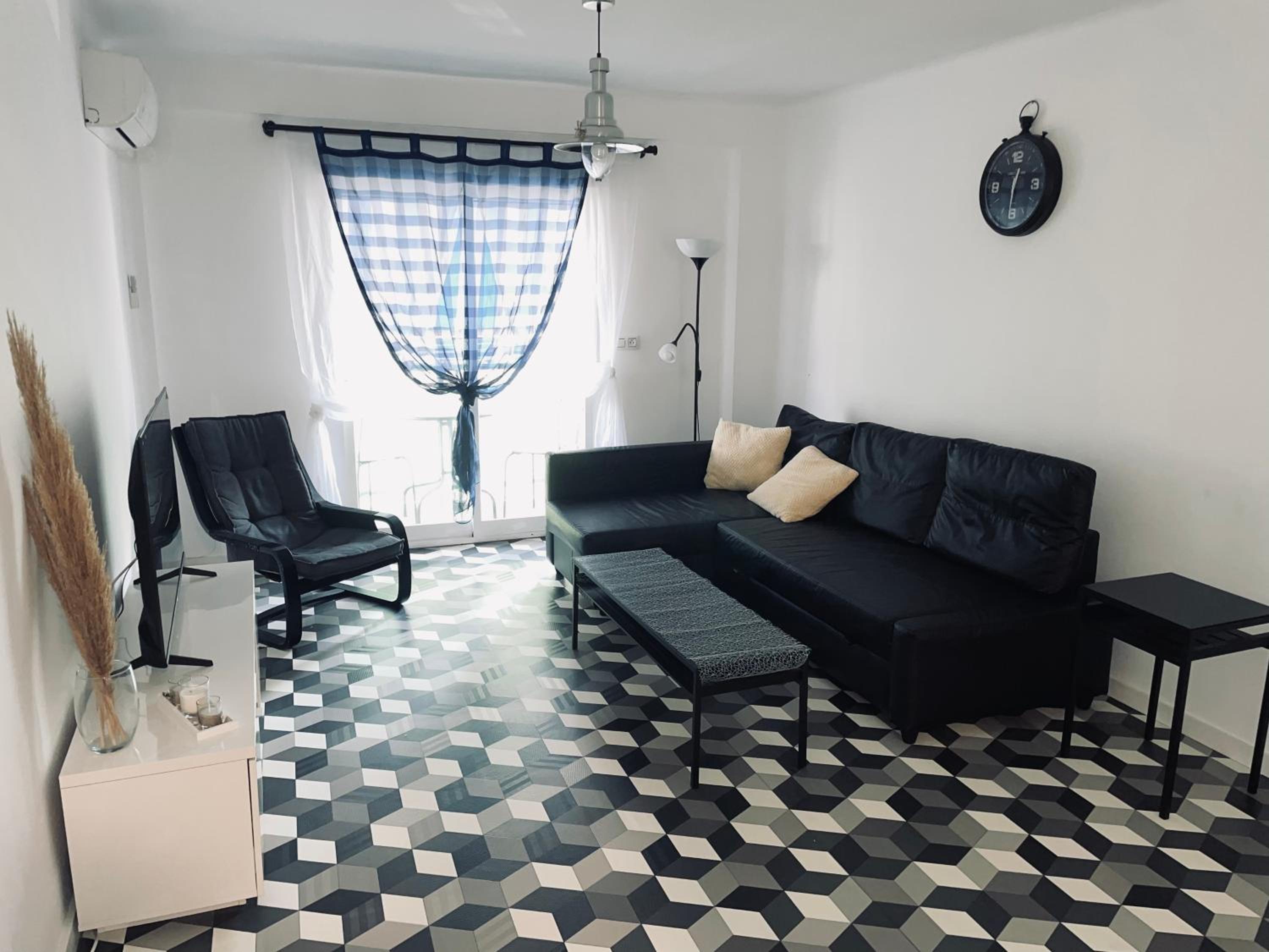 Three-Bedroom Apartment photo 2