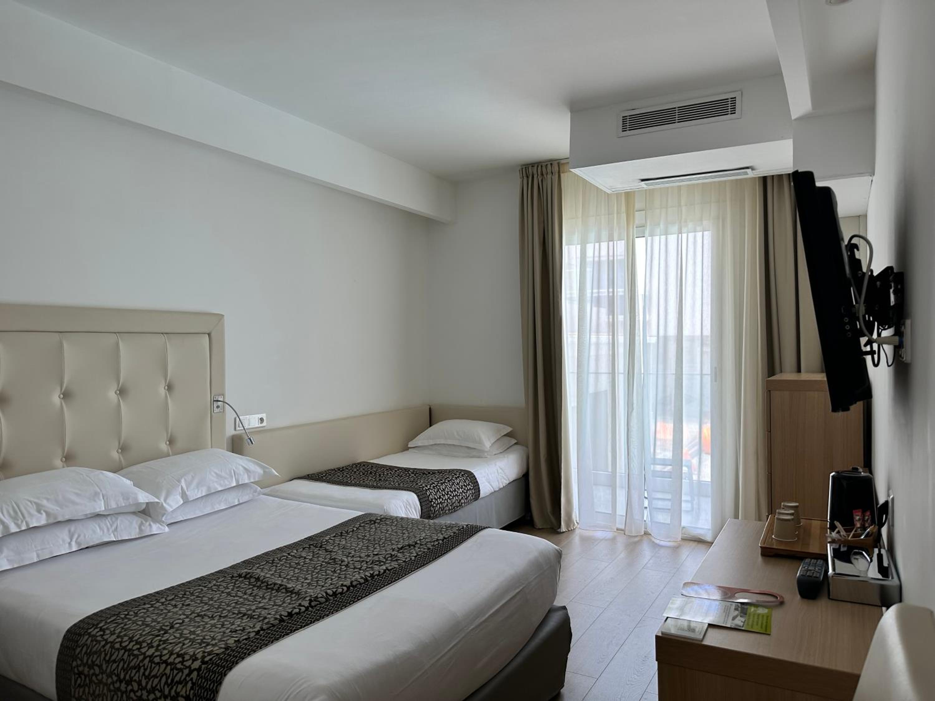 XL – Chambre Triple avec Balcon