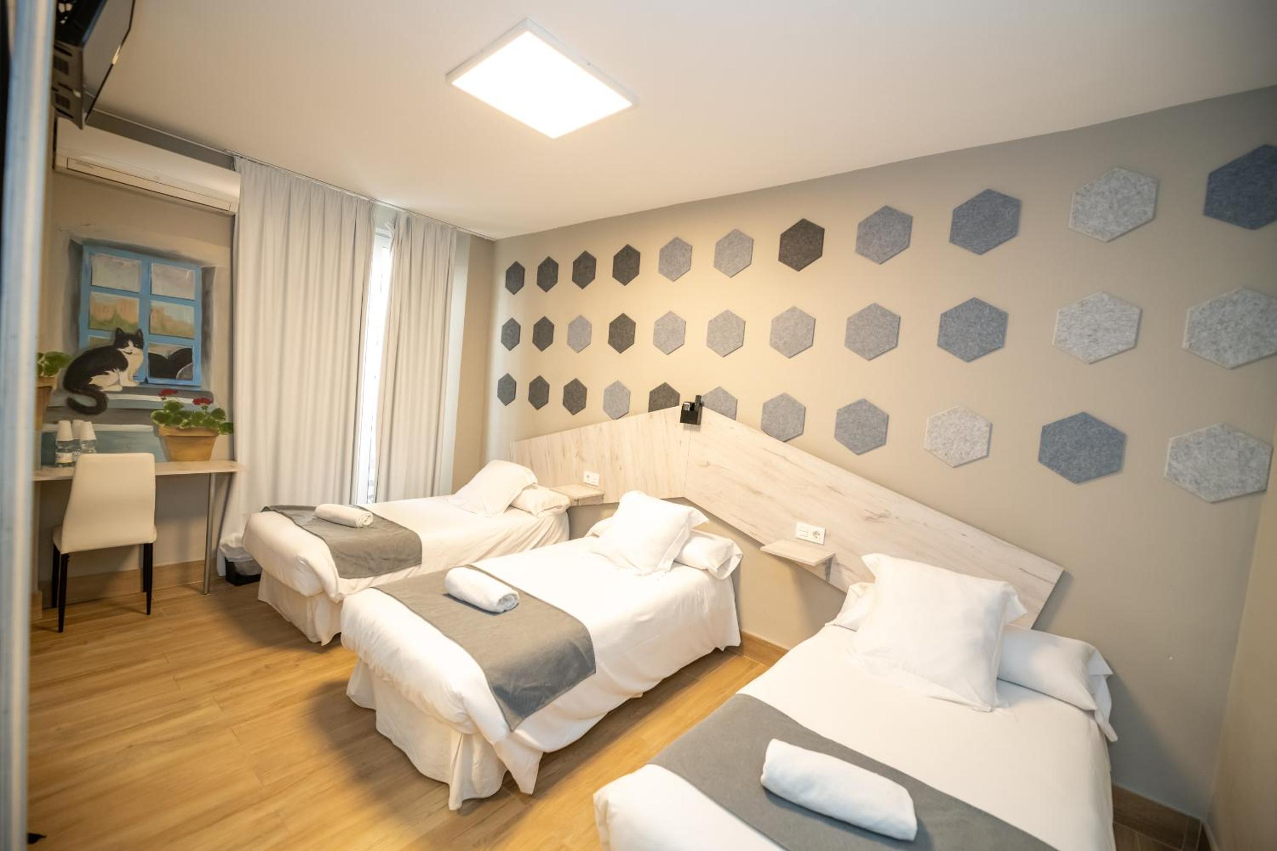 Triple Room - Photo 1