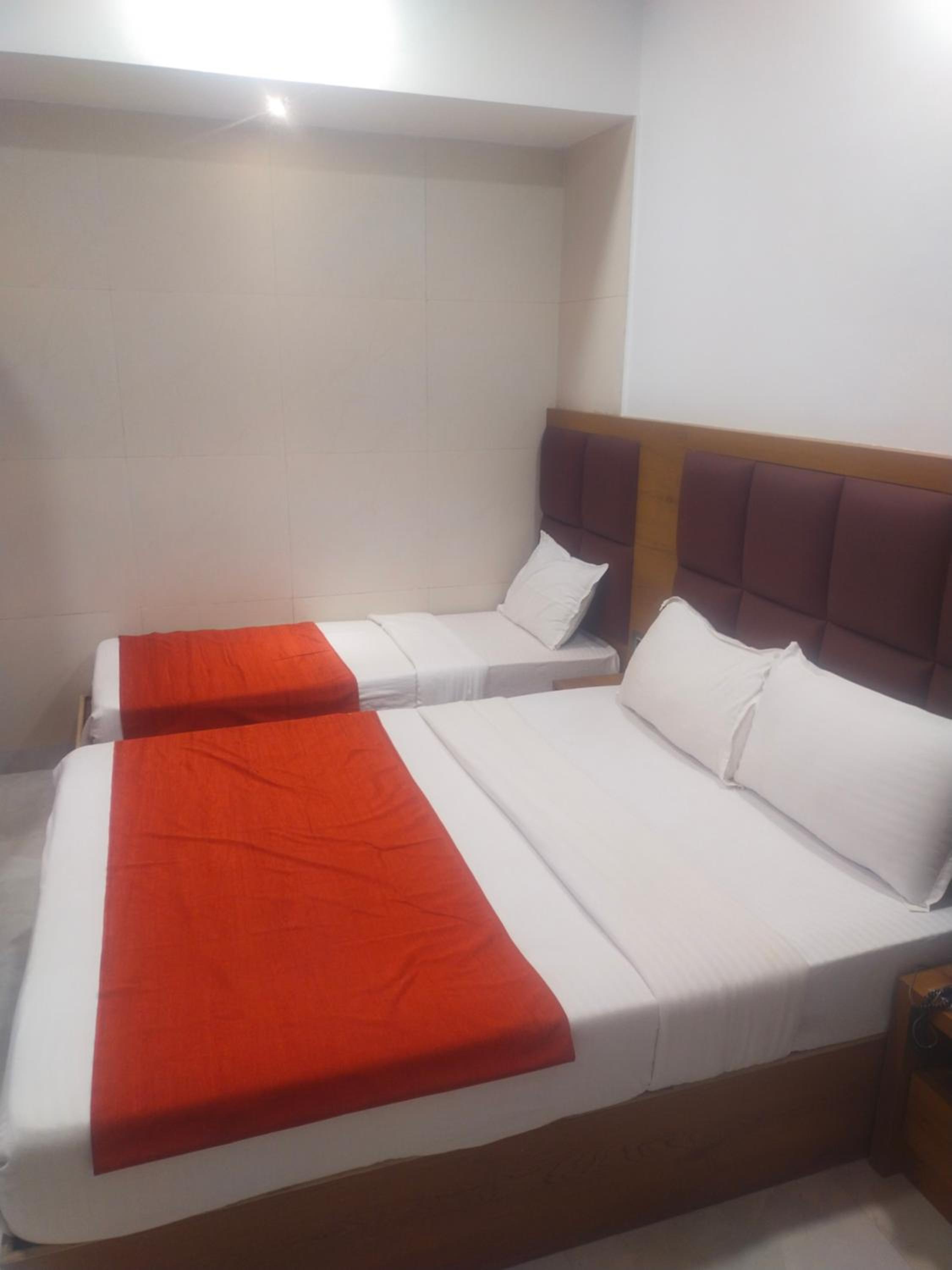 Deluxe Triple Room - Photo 8