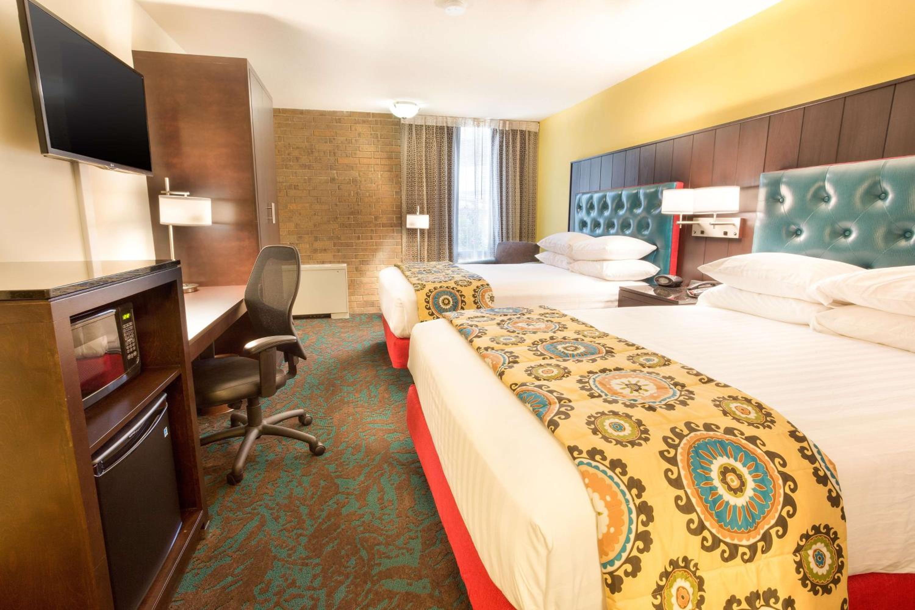 Deluxe Queen Room With Two Queen Beds - Photo 1