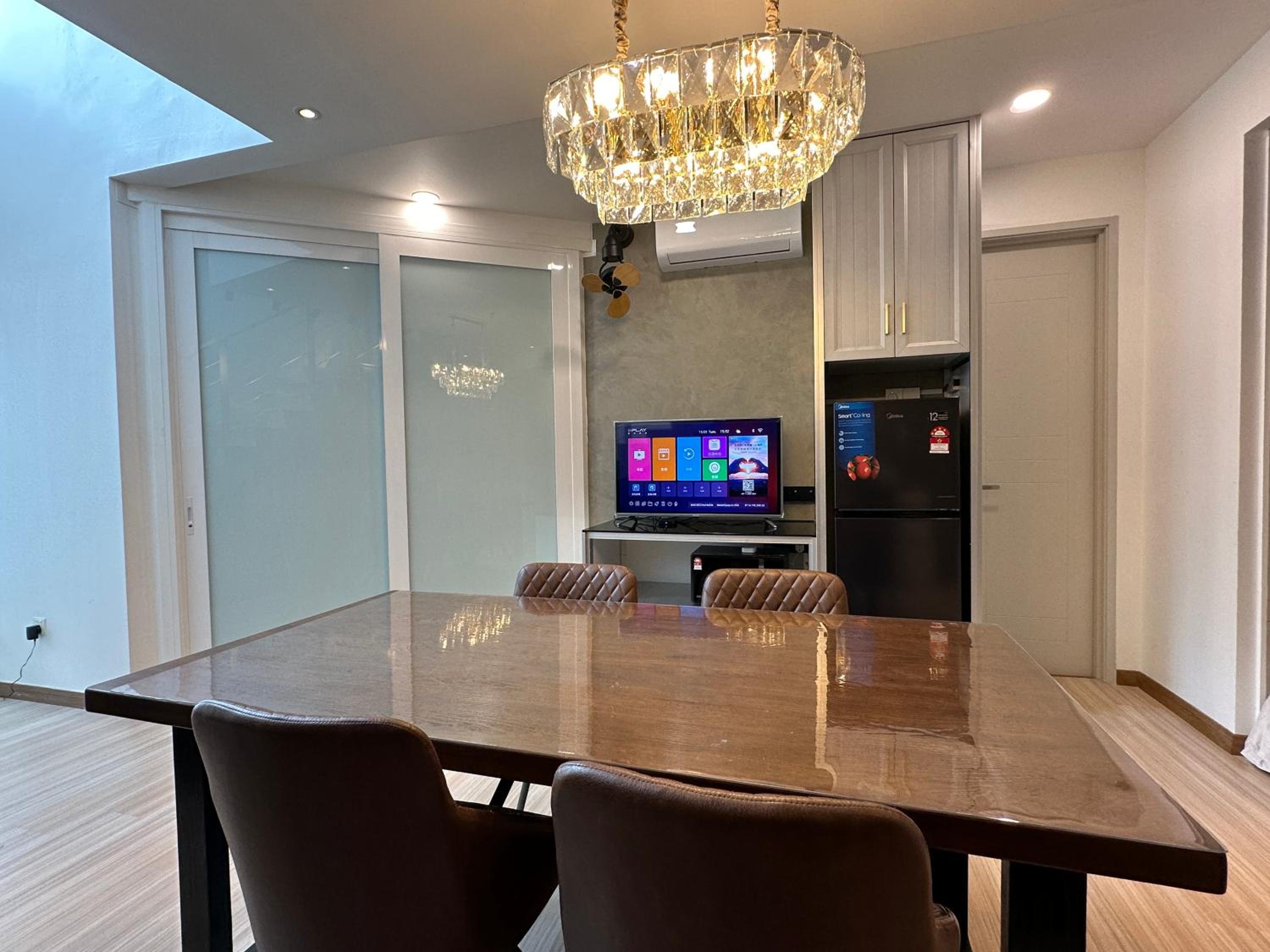Three-Bedroom Apartment - Photo 2