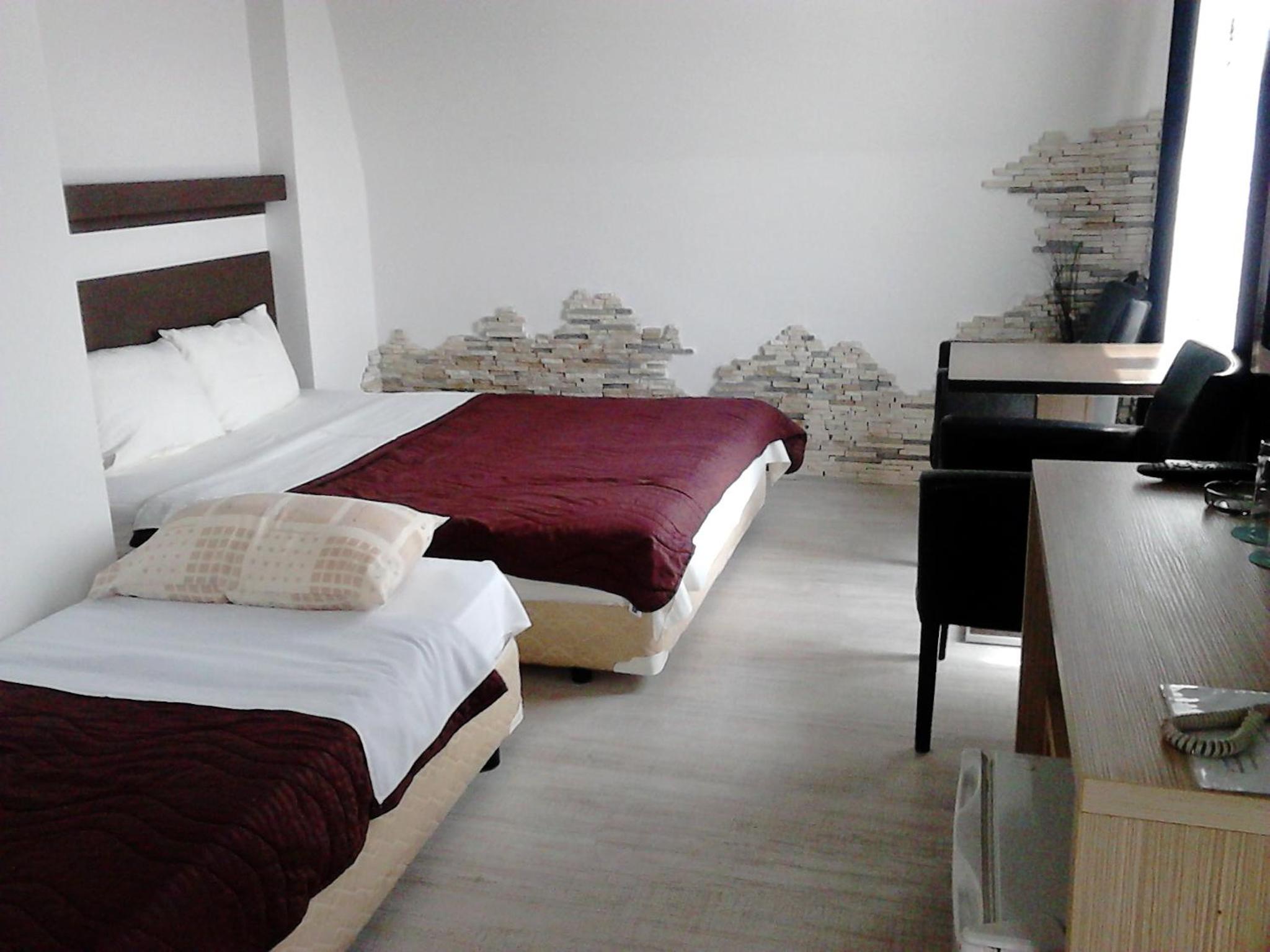Quadruple Room - Photo 17