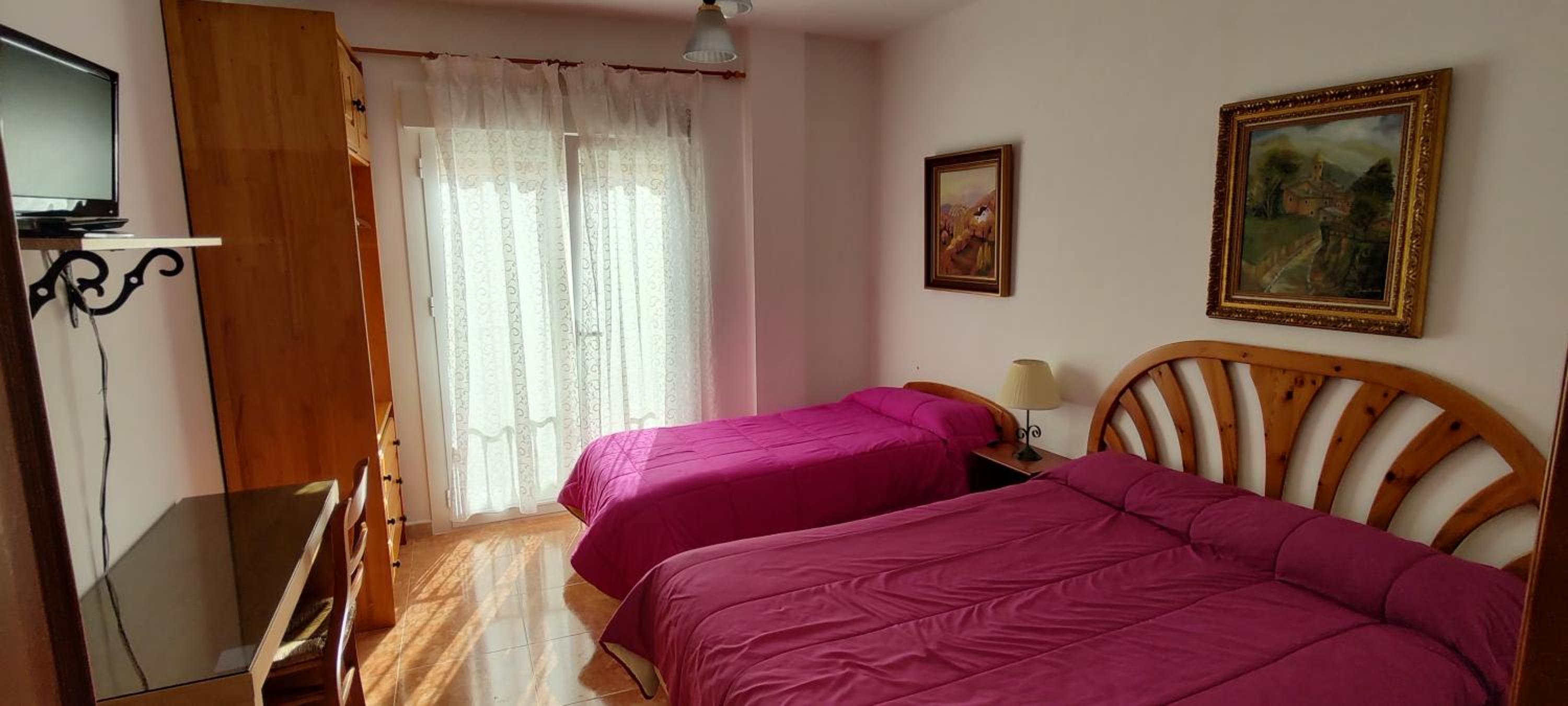 Habitación Triple con Balcón