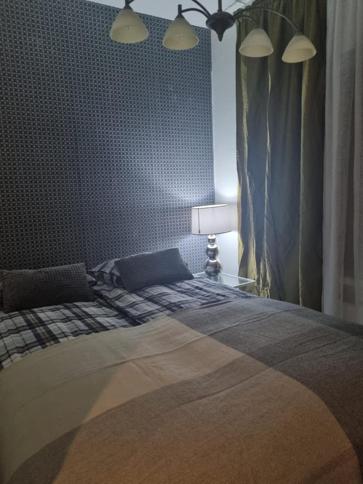 Two-Bedroom Apartment with Balcony
