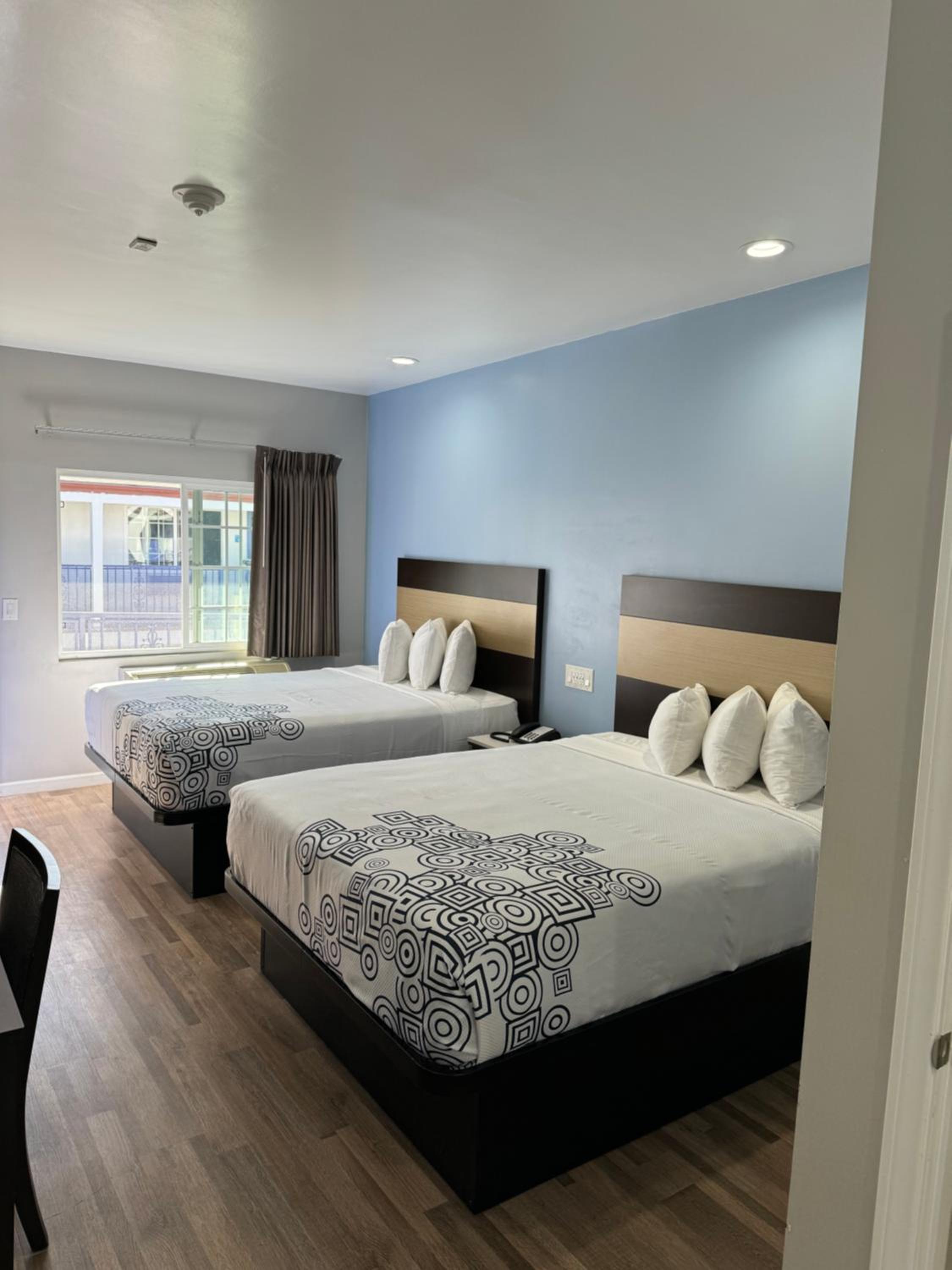 Queen Room with Two Queen Beds - Photo 1