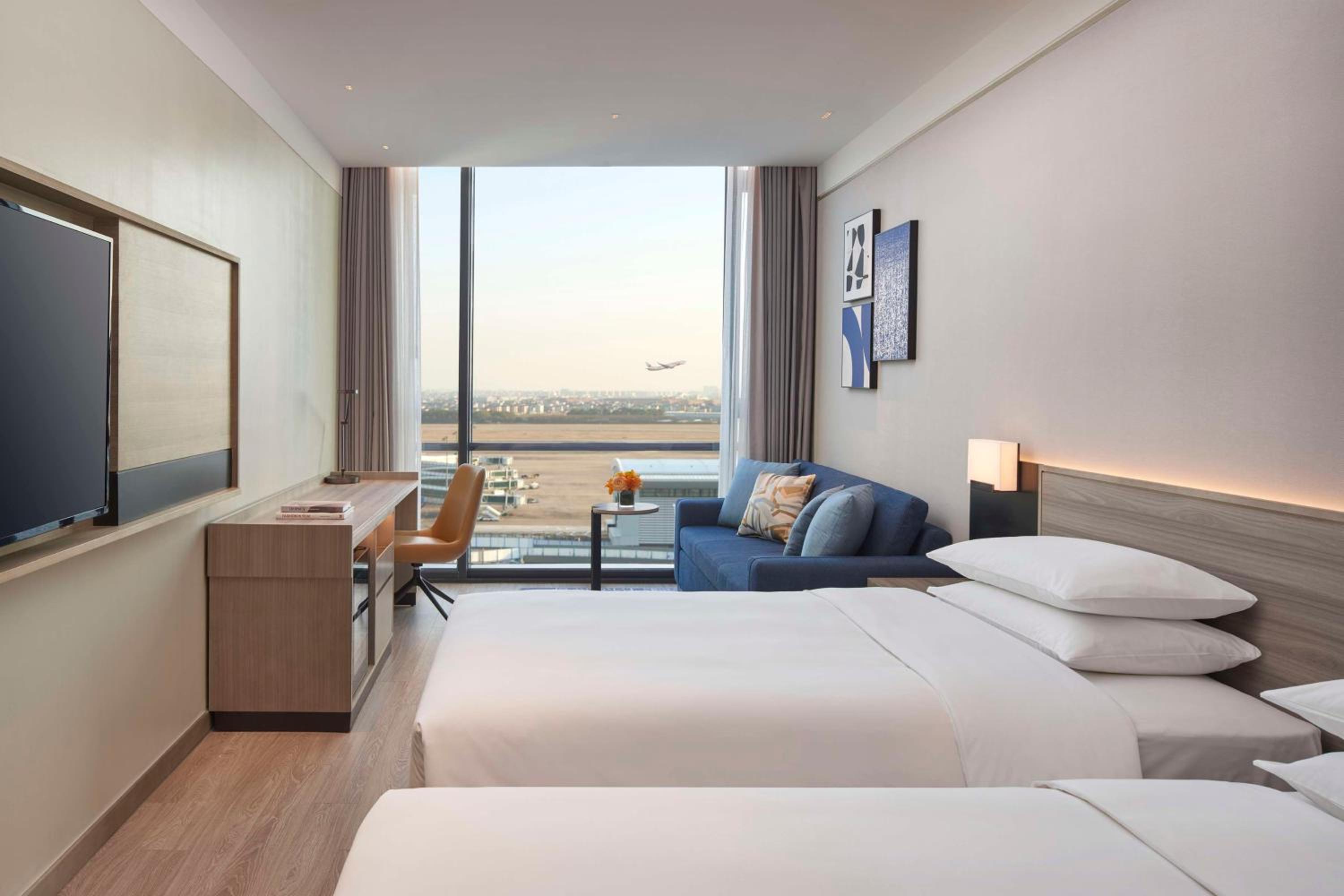 Twin Room with Sofa Bed and Airport View photo 1