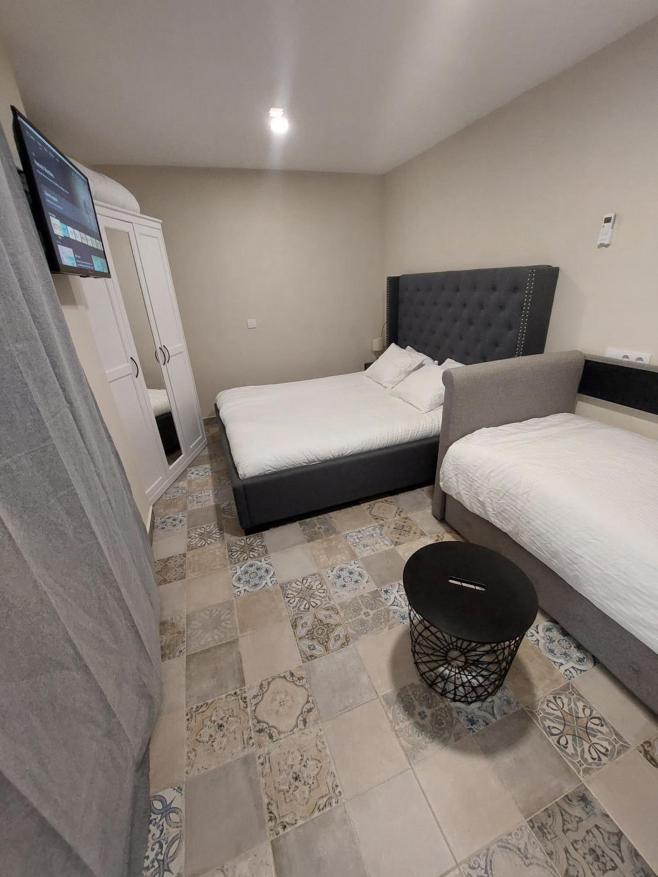 Habitación Cuádruple con Baño Privado
