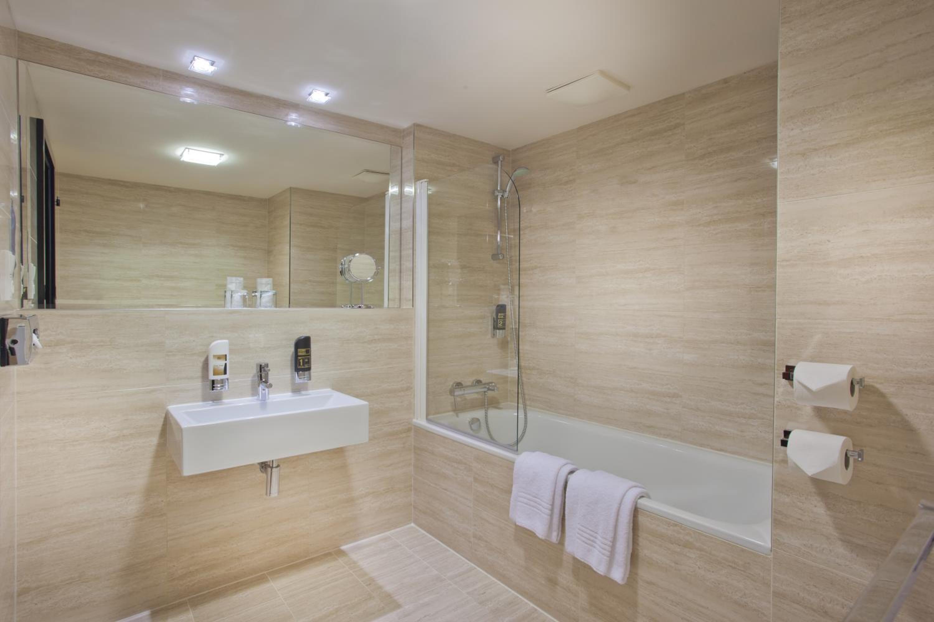 Relax in our elegant and modern bathroom oasis.