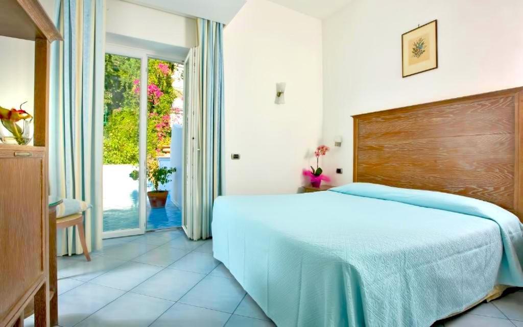 Habitación Doble o con Dos Camas con Vista al Jardín