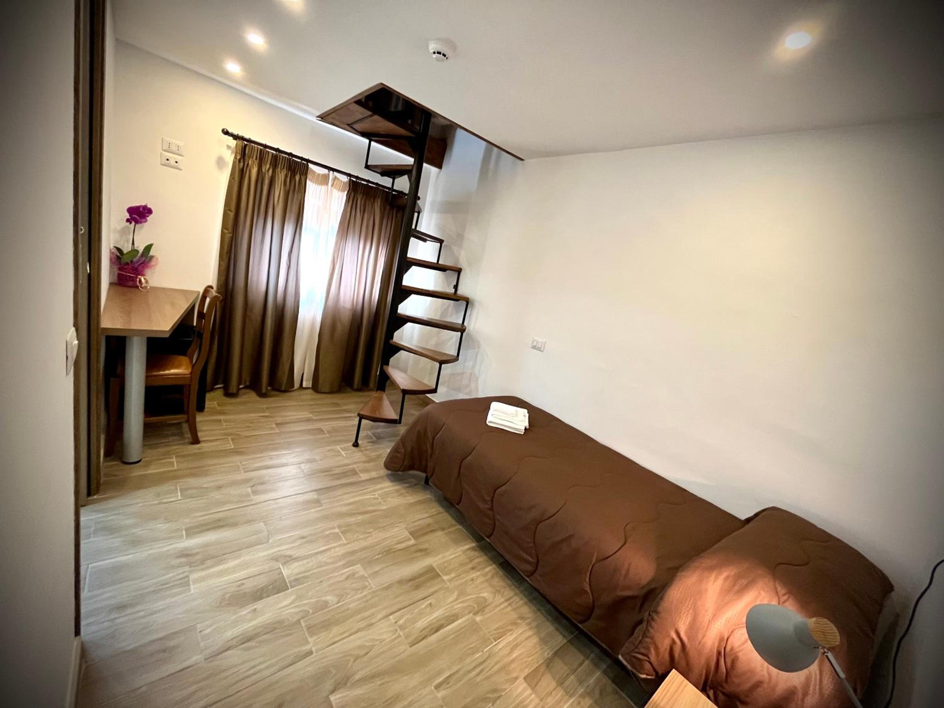 Triple Room with Terrace photo 1