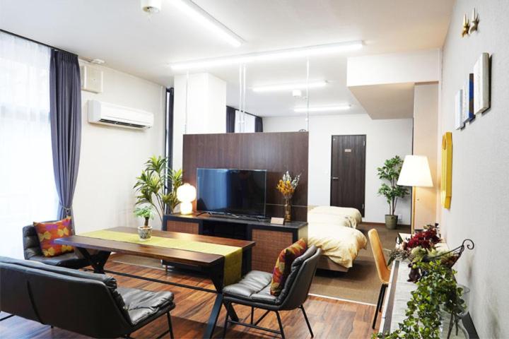 Three-Bedroom Apartment photo 1