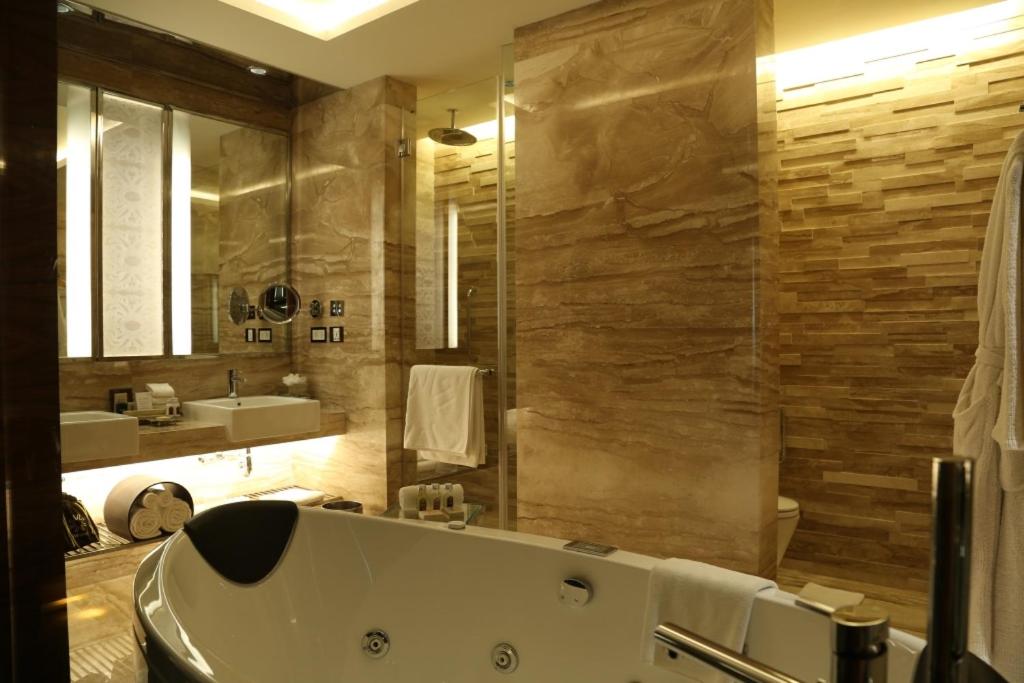 Presidential Suite with One way airport transfers by Luxury Sedan , In - room Breakfast, Butler Service, 02 Pcs of Ironing per day, Complimentary Mini-bar,20% disc on FNSB, Laundry, transport, Lounge Access with Cocktail hours from 18:00 - 20:00 Hrs,