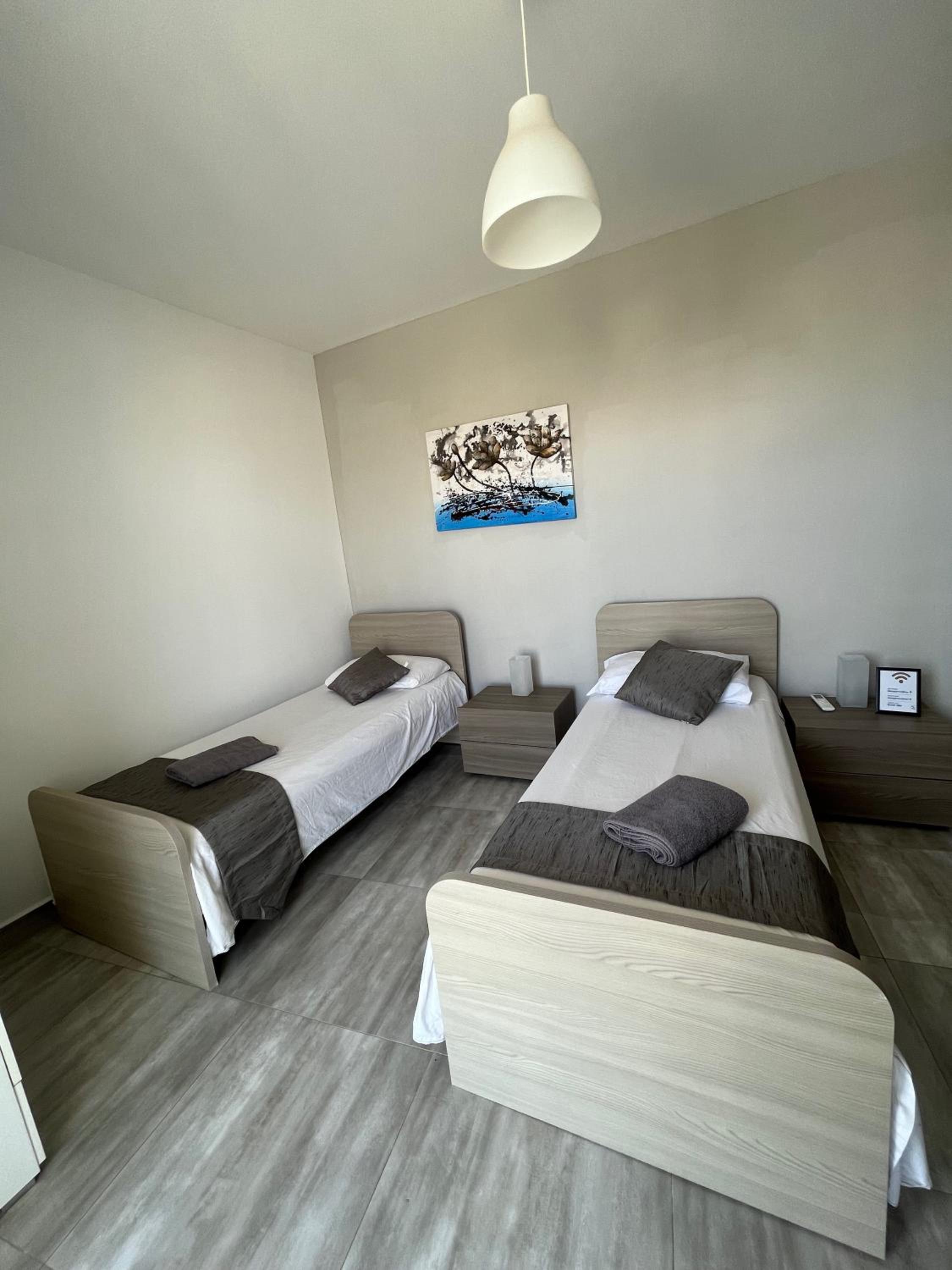 Three-Bedroom Apartment - Photo 5