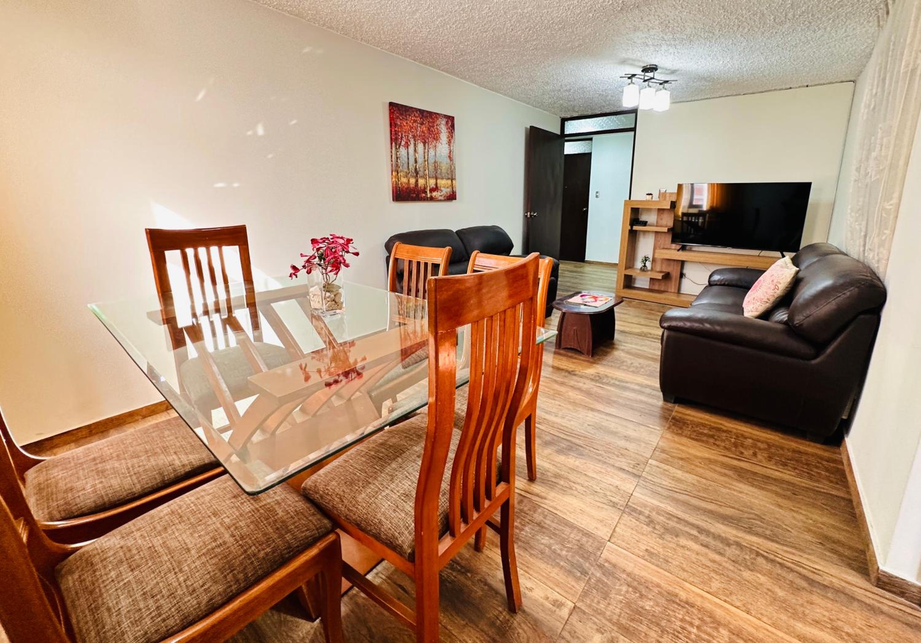 Three-Bedroom Apartment - Photo 2