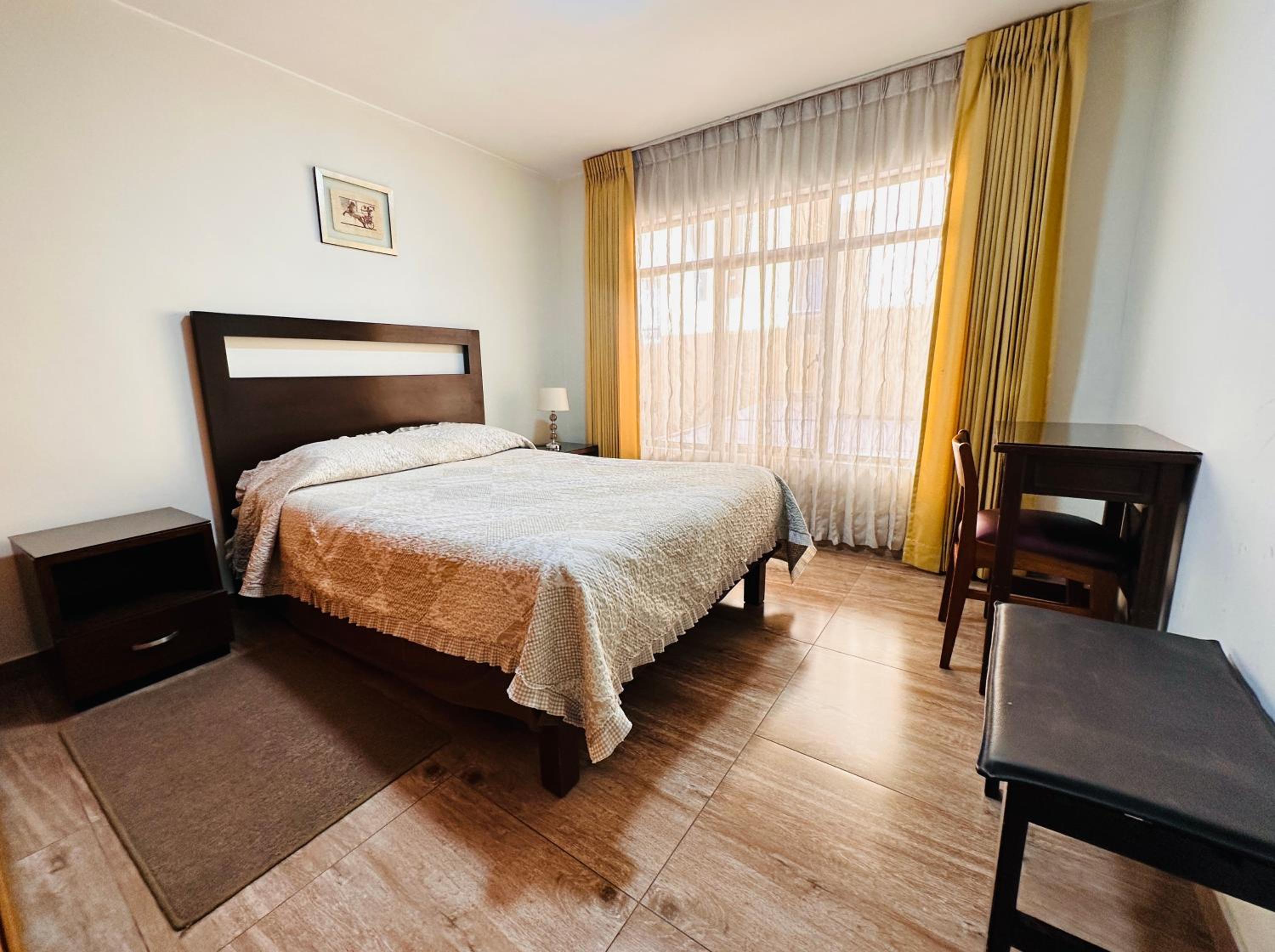Three-Bedroom Apartment - Photo 4