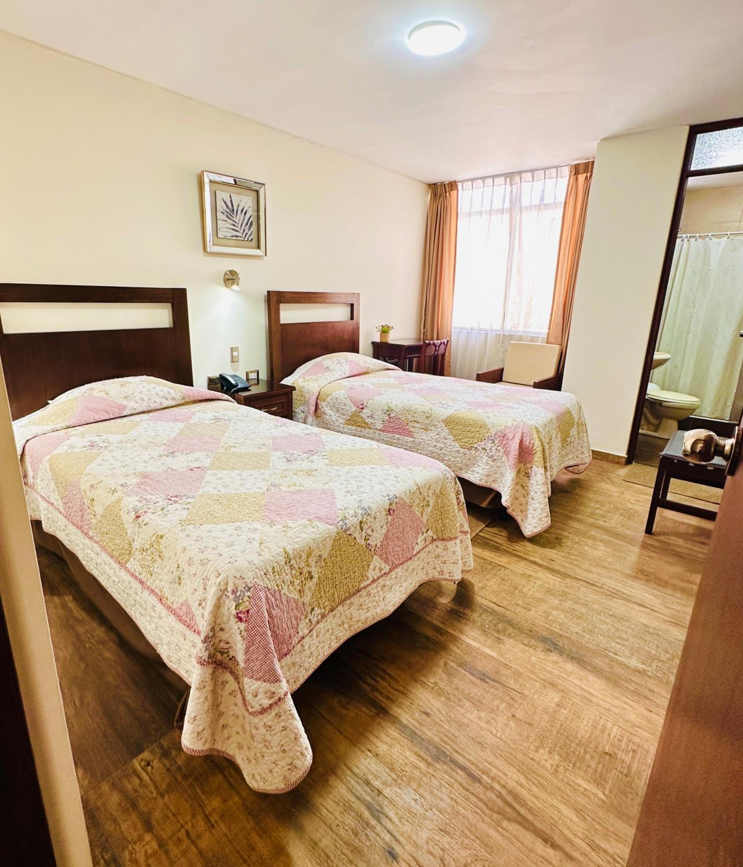 Twin Room - Photo 1