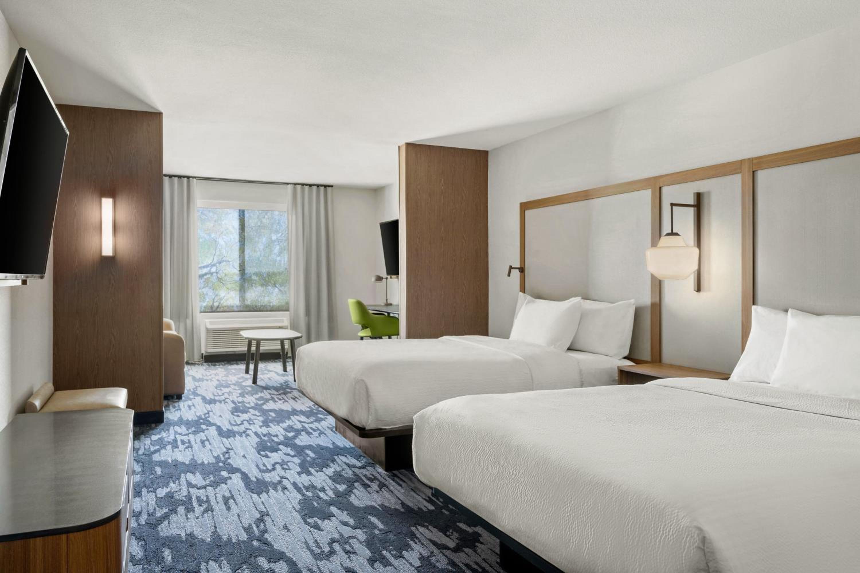 Suite with Two Queen Beds with Sofa Bed and City View