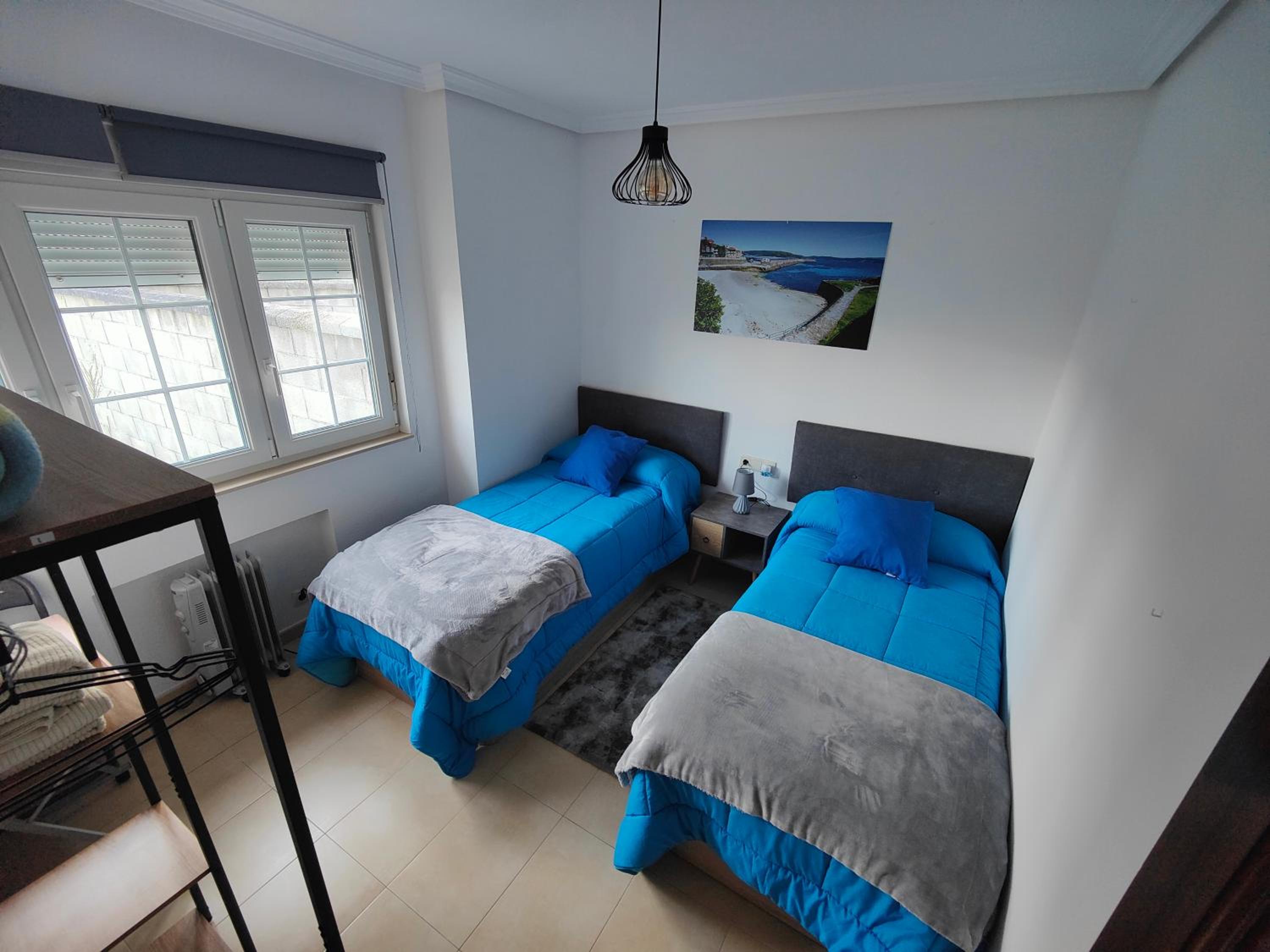Habitación Estándar con Dos Camas y Baño Compartido