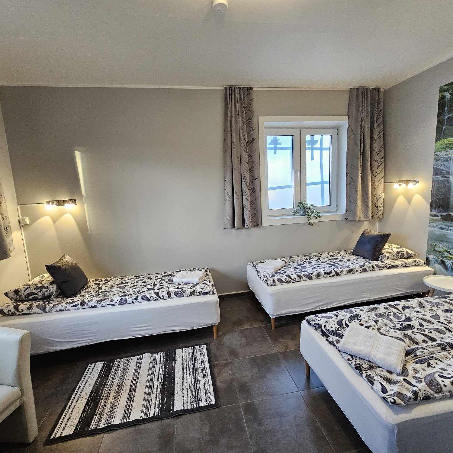 Three-Bedroom Apartment photo 1
