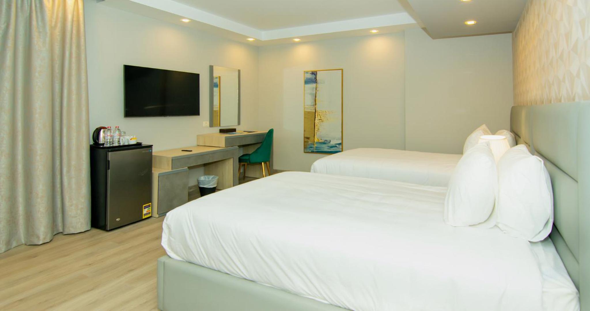 Habitación Queen con Dos Camas Queen