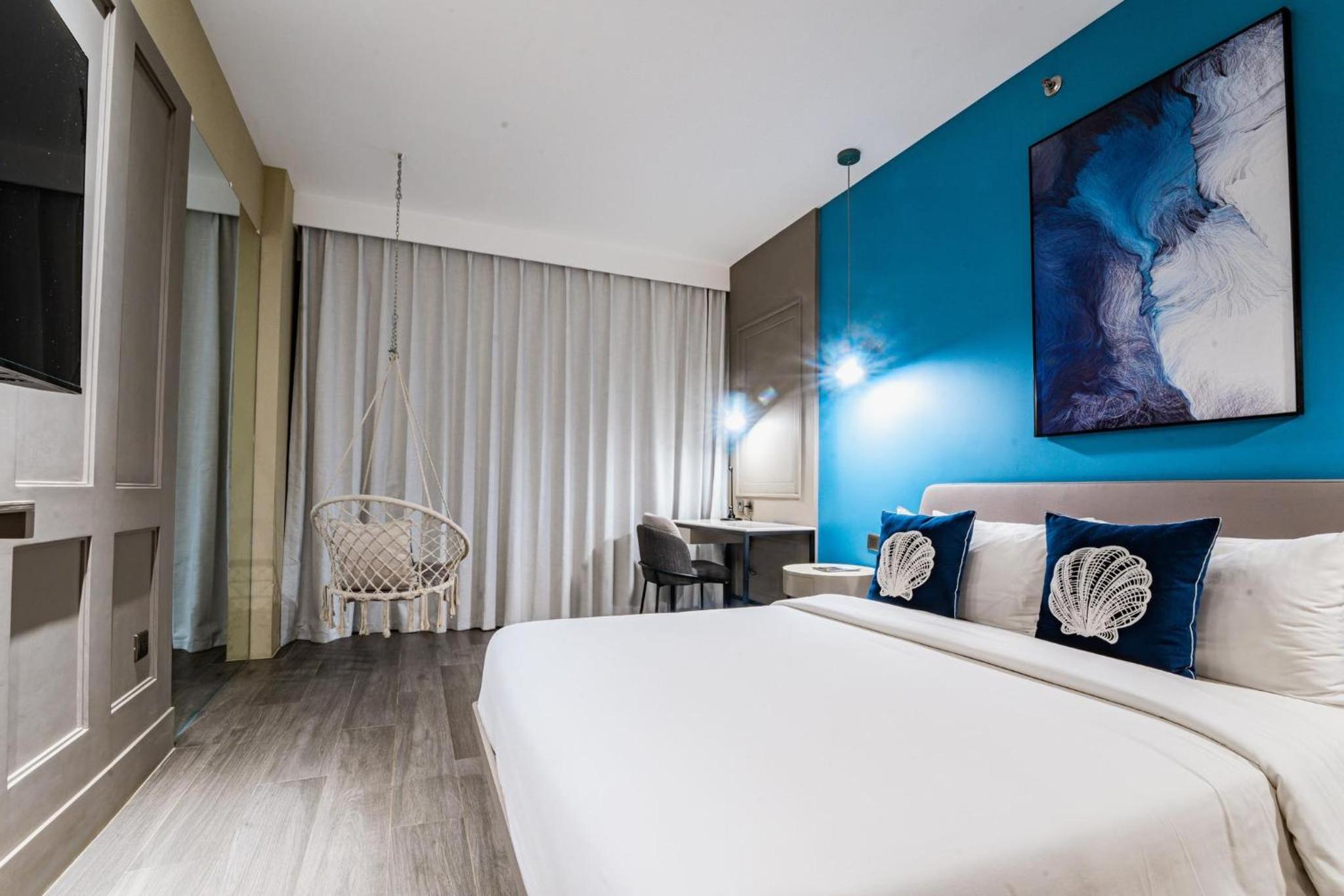 Deluxe Room with Town View - Photo 1