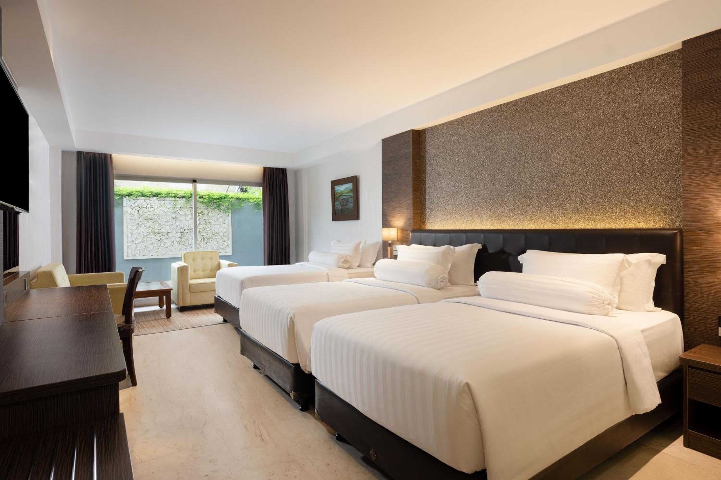 Deluxe Family Twin Room, with FREE daily shuttle to Ubud City, FREE Photo Session, FREE Art Gallery Visit, 24-hour access to Fitness Center, FREE Welcome Drink, and FREE Kids Activities. photo 1