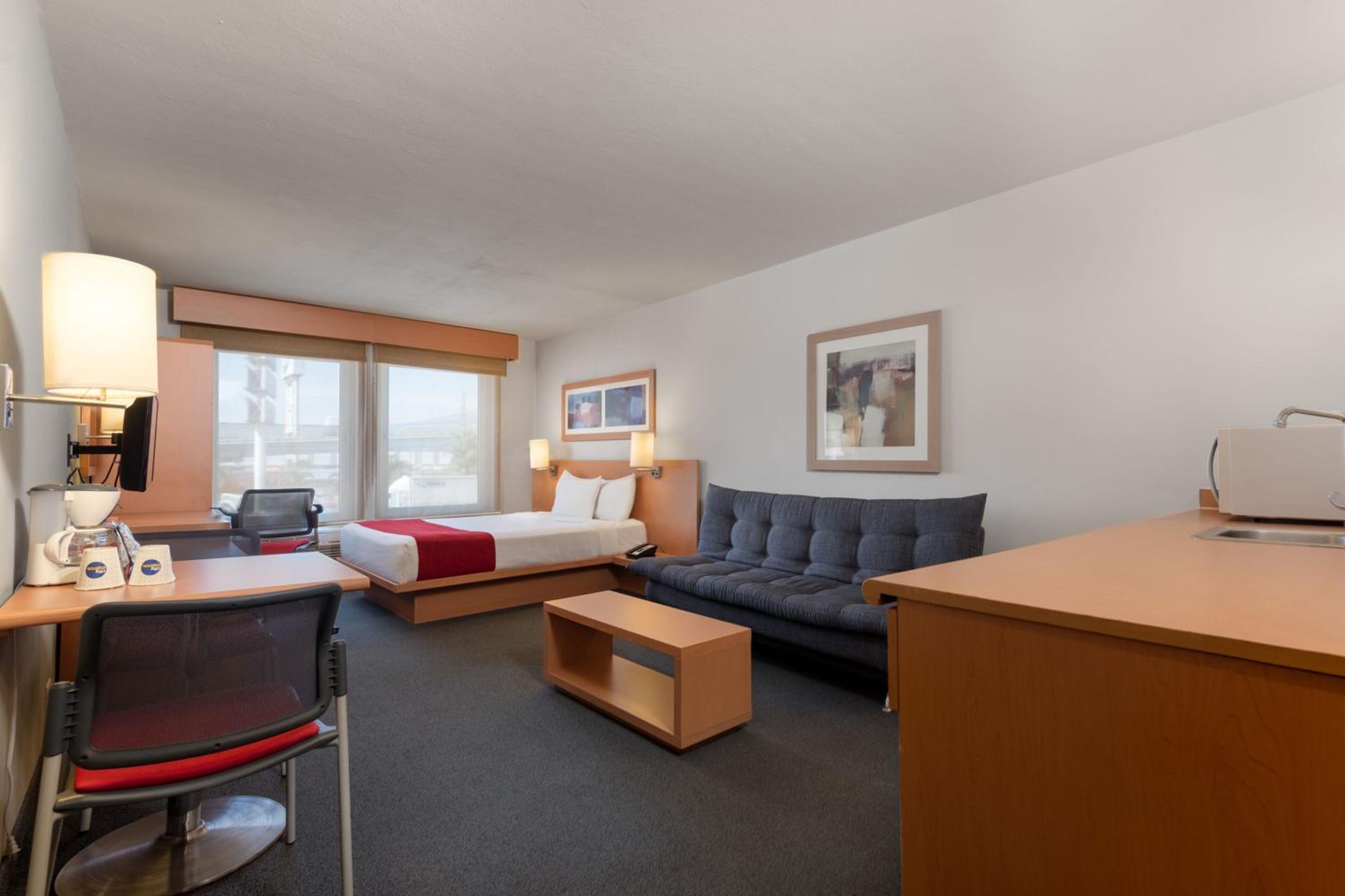 Queen Suite with Sofa Bed - Photo 1