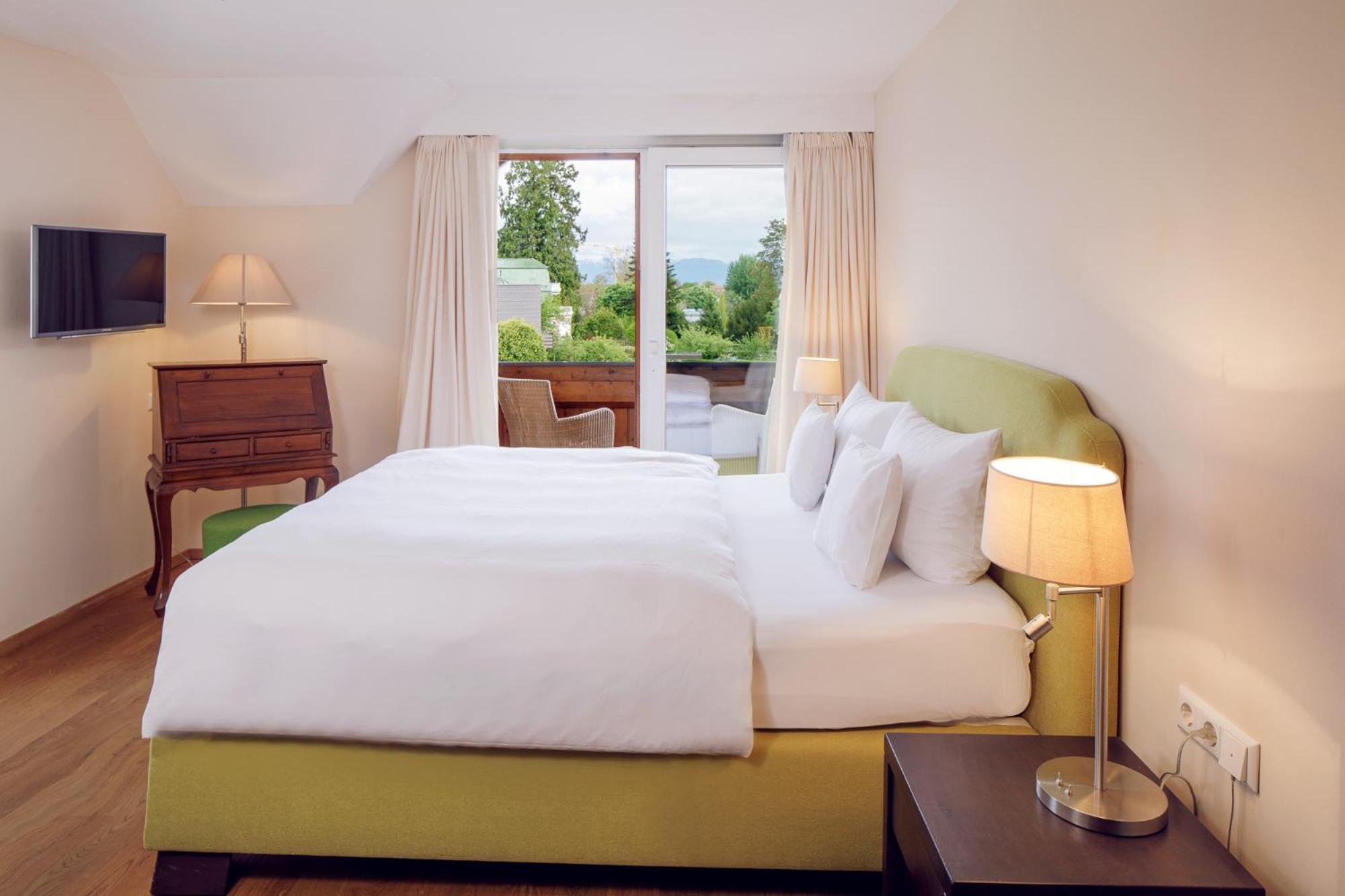 Comfort Double Room with Balcony with wooden railing (limited lake view) photo 1