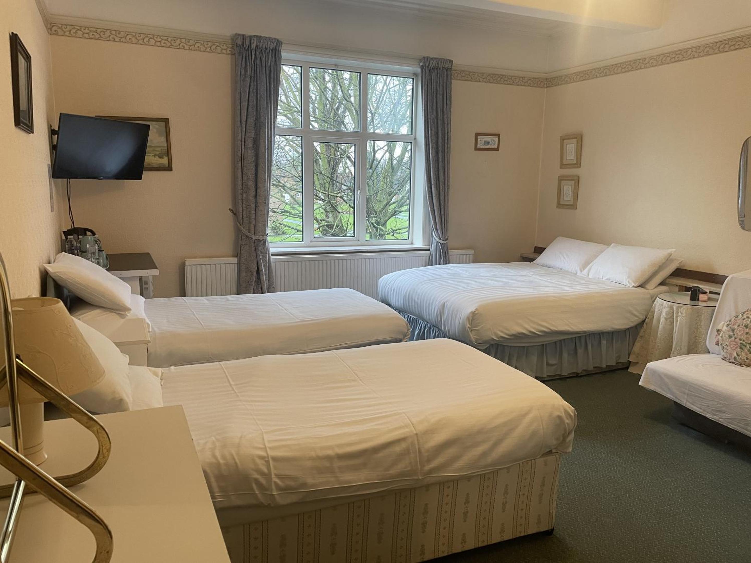 Deluxe Quadruple Room - Photo 1