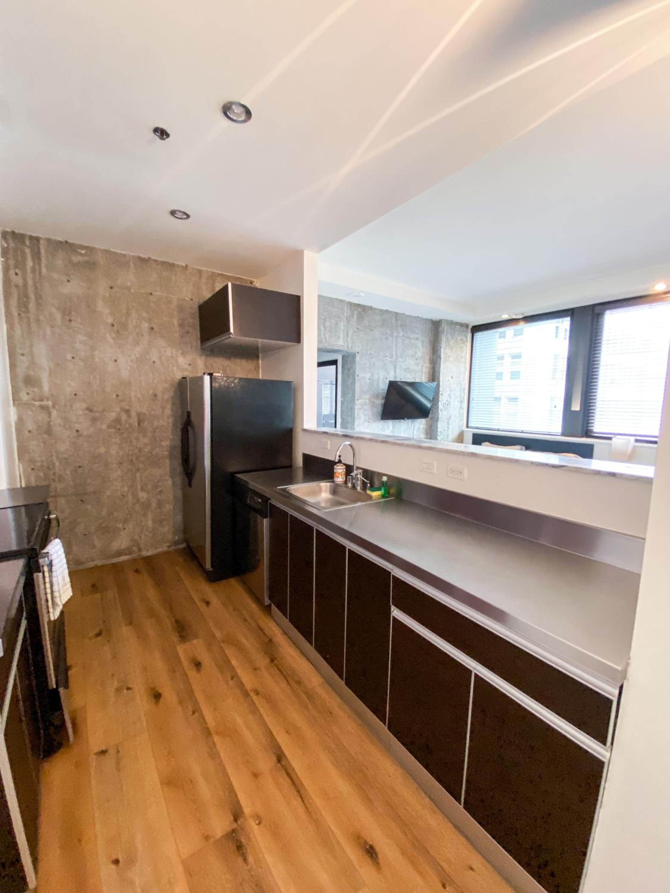 One -Bedroom Deluxe Suite with Two Queen Beds, One Twin Bed, Non-Smoking