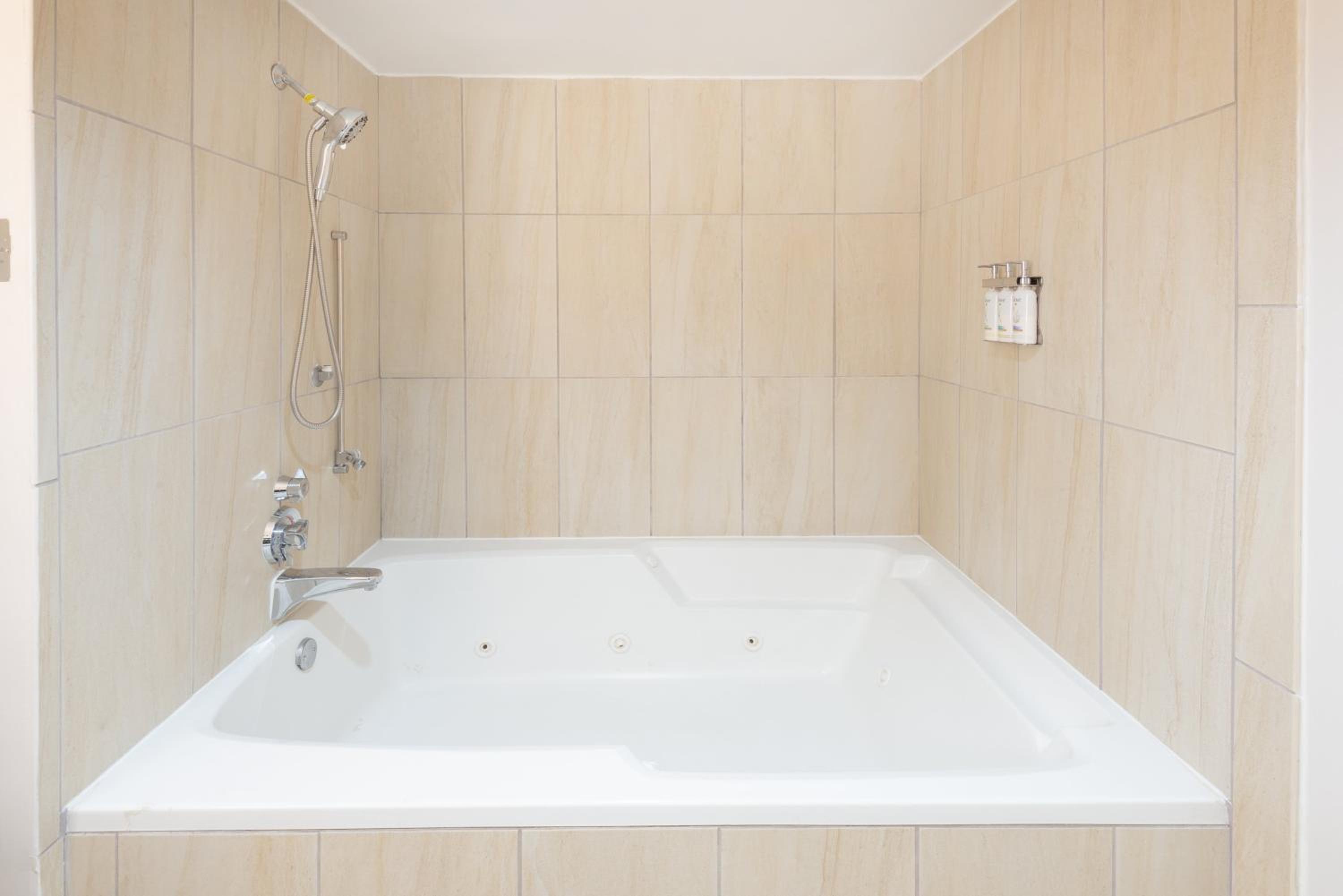 Premium King Room with Jetted Tub - Photo 9