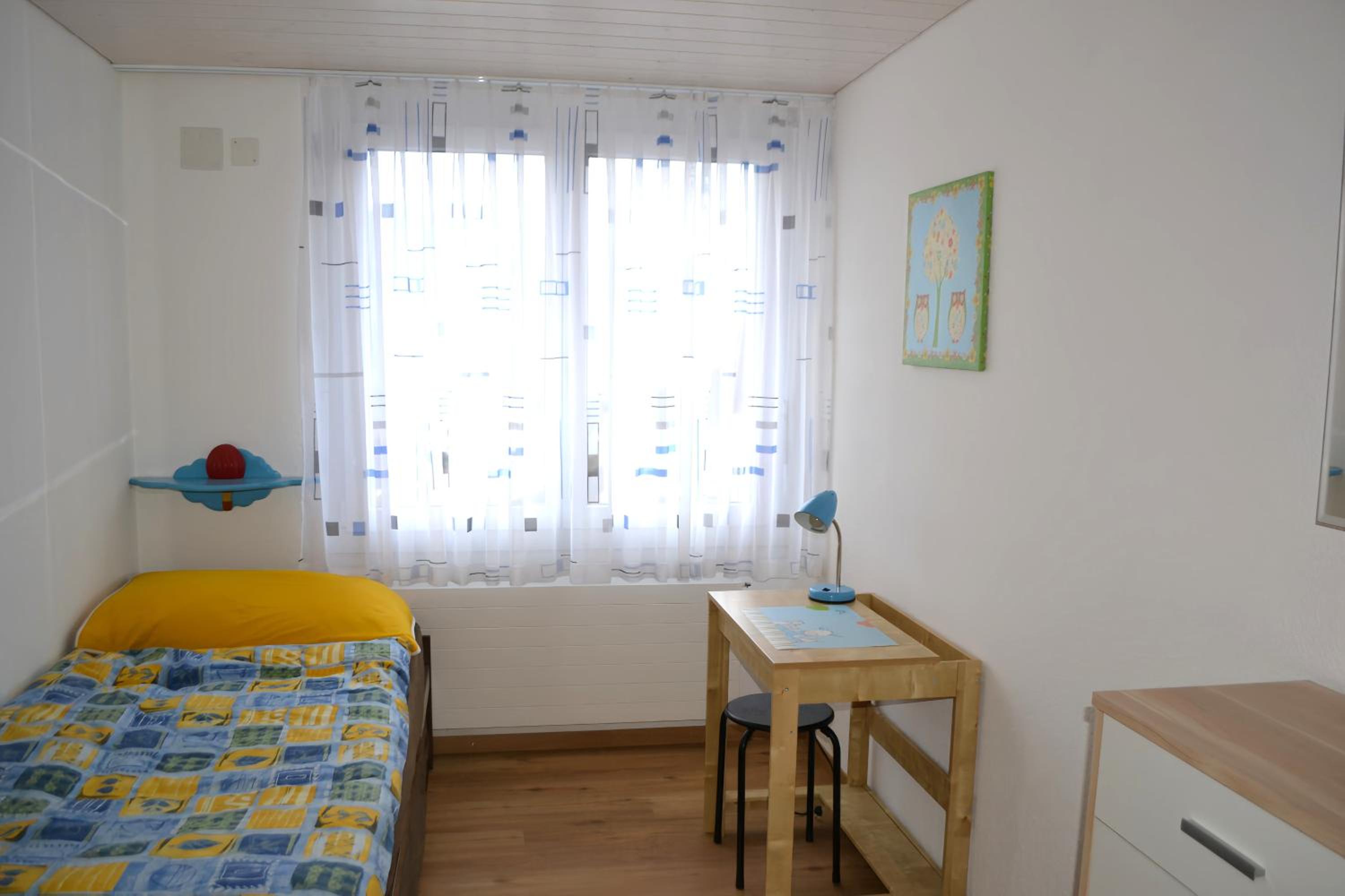 Three-Bedroom Apartment photo 2