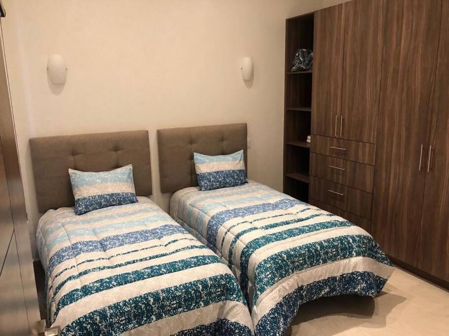 Three-Bedroom Apartment photo 1