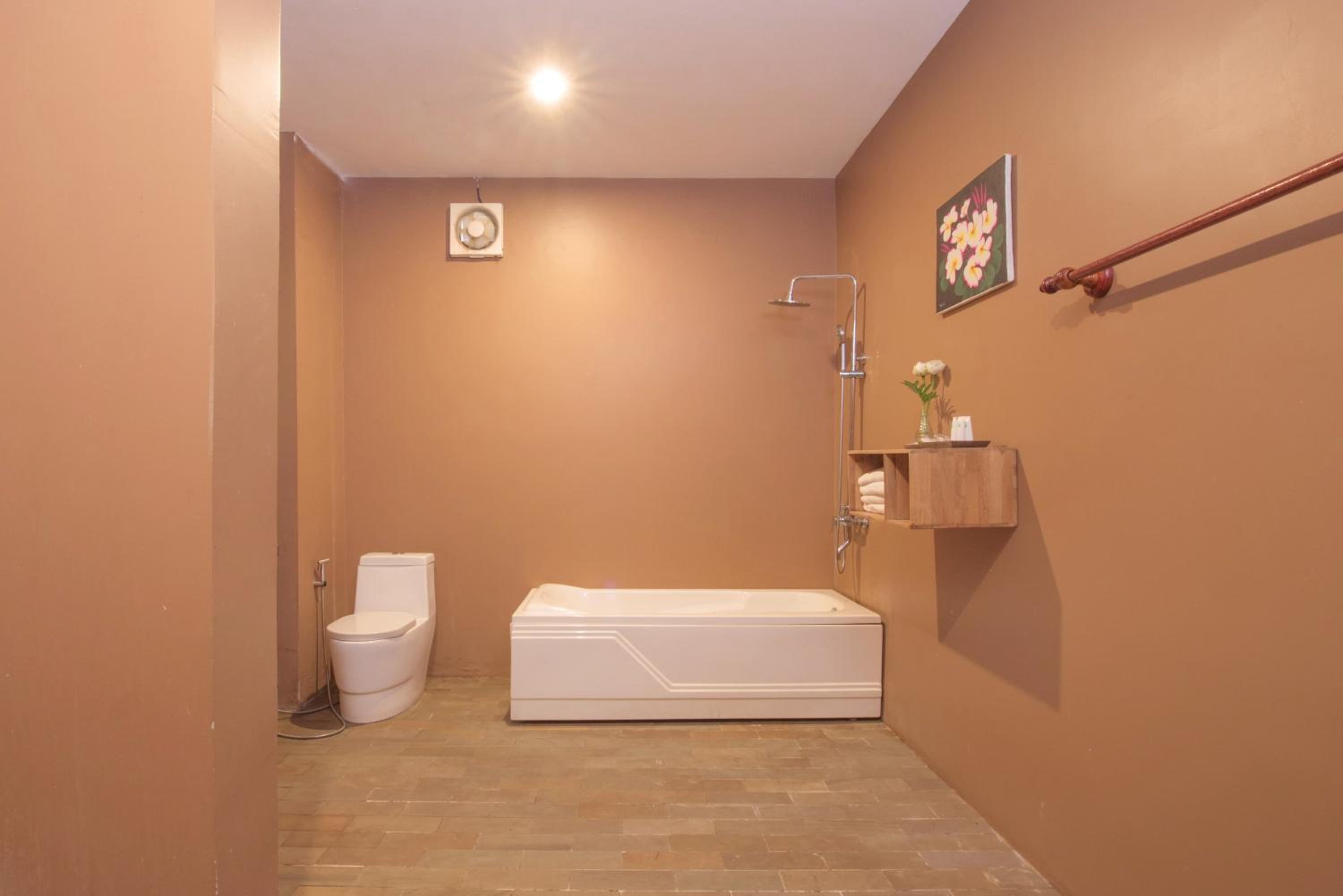 Deluxe Triple Room - Photo 12