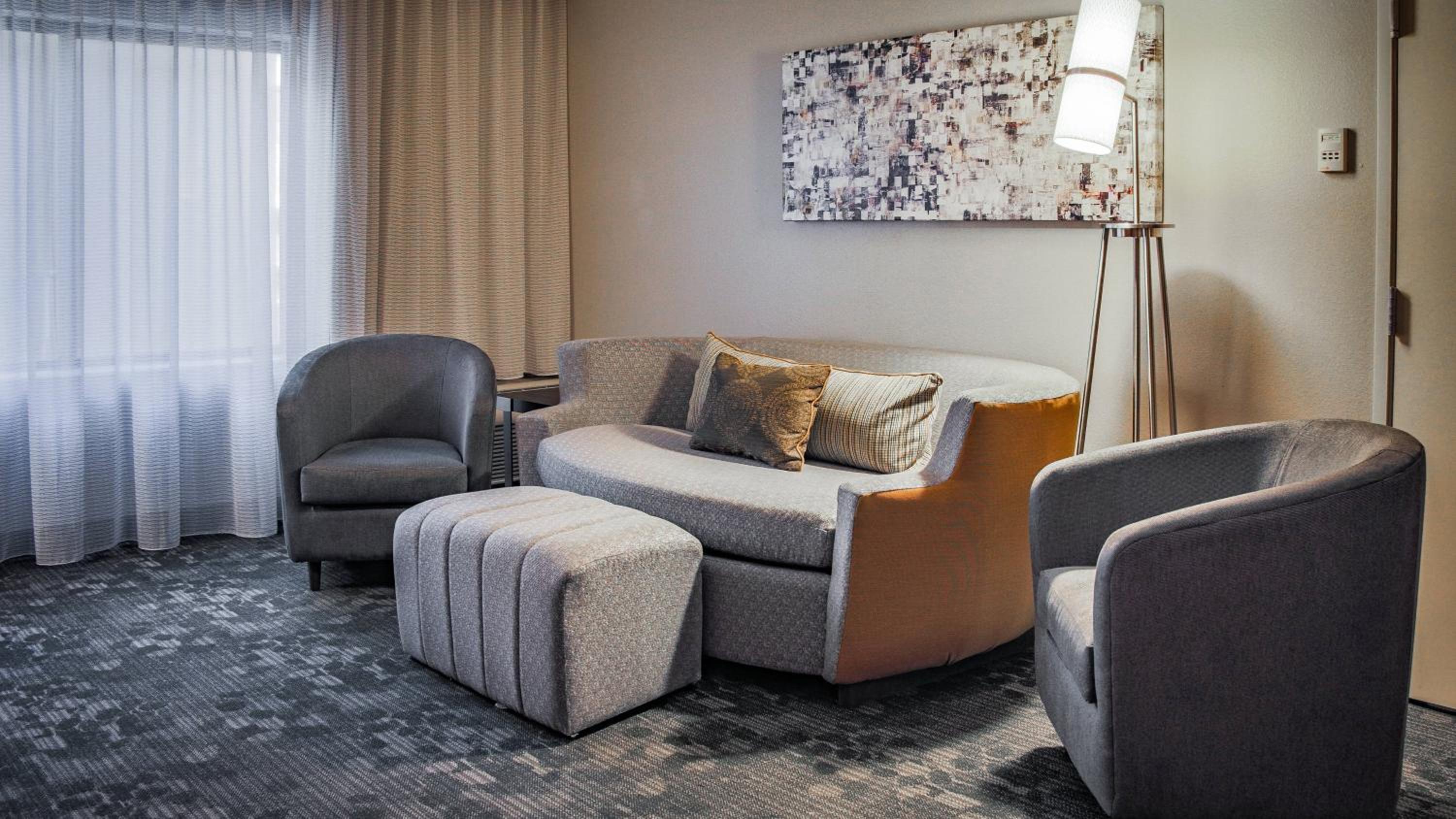 One-Bedroom Queen Suite with Sofa Bed - Photo 1