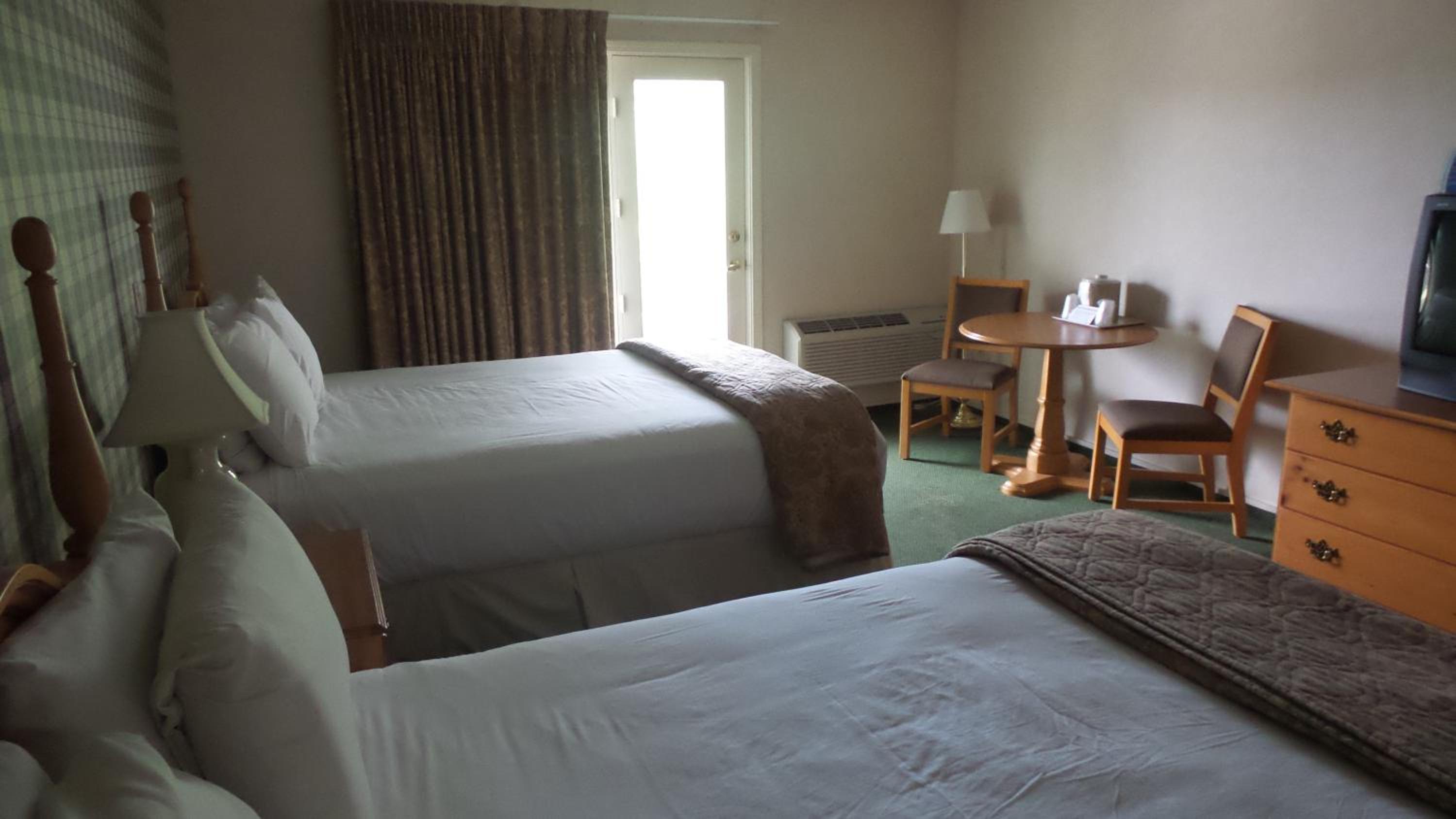 Queen Room with Two Queen Beds - Photo 1