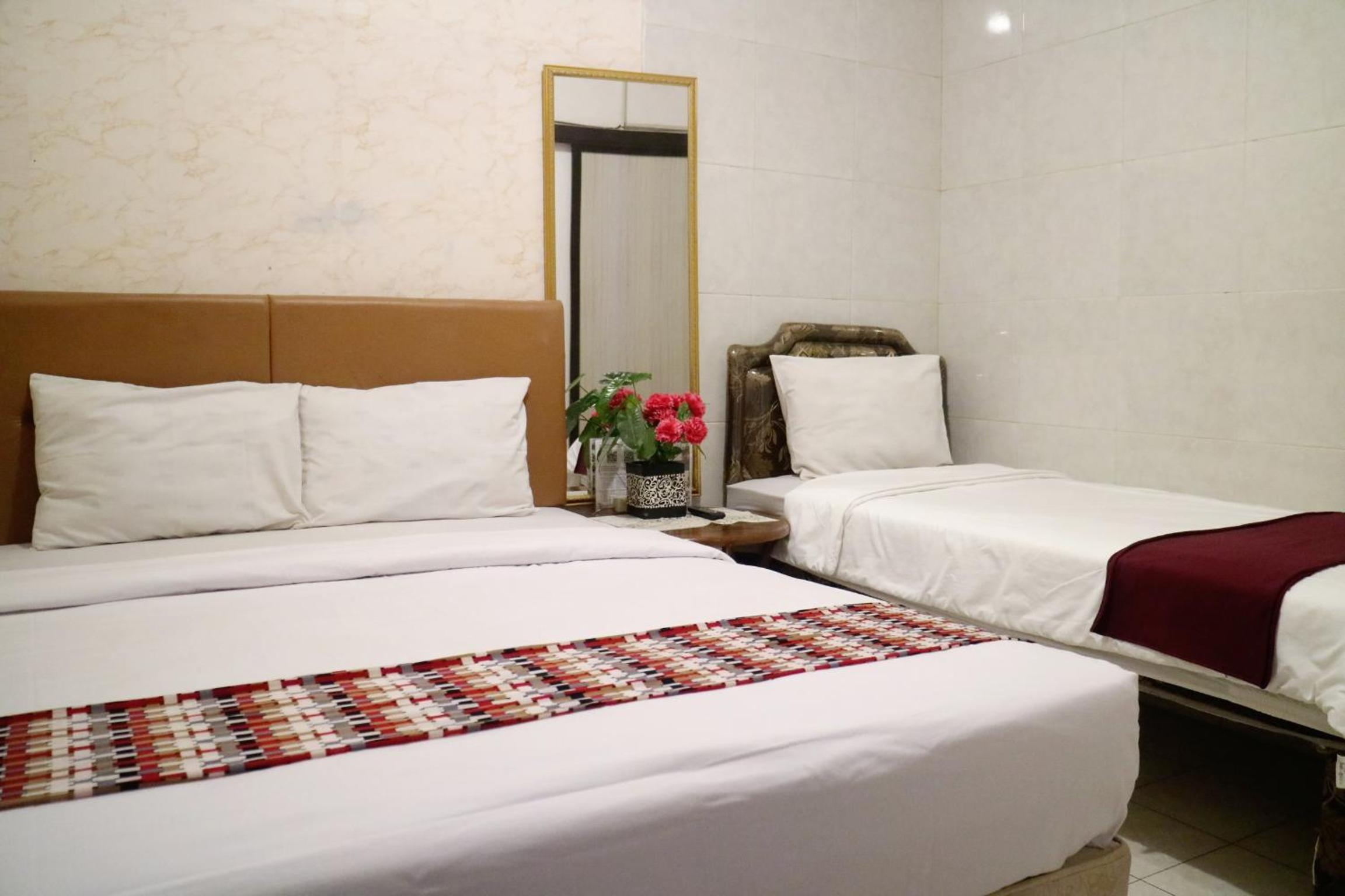 Triple Room with Garden View - Photo 1