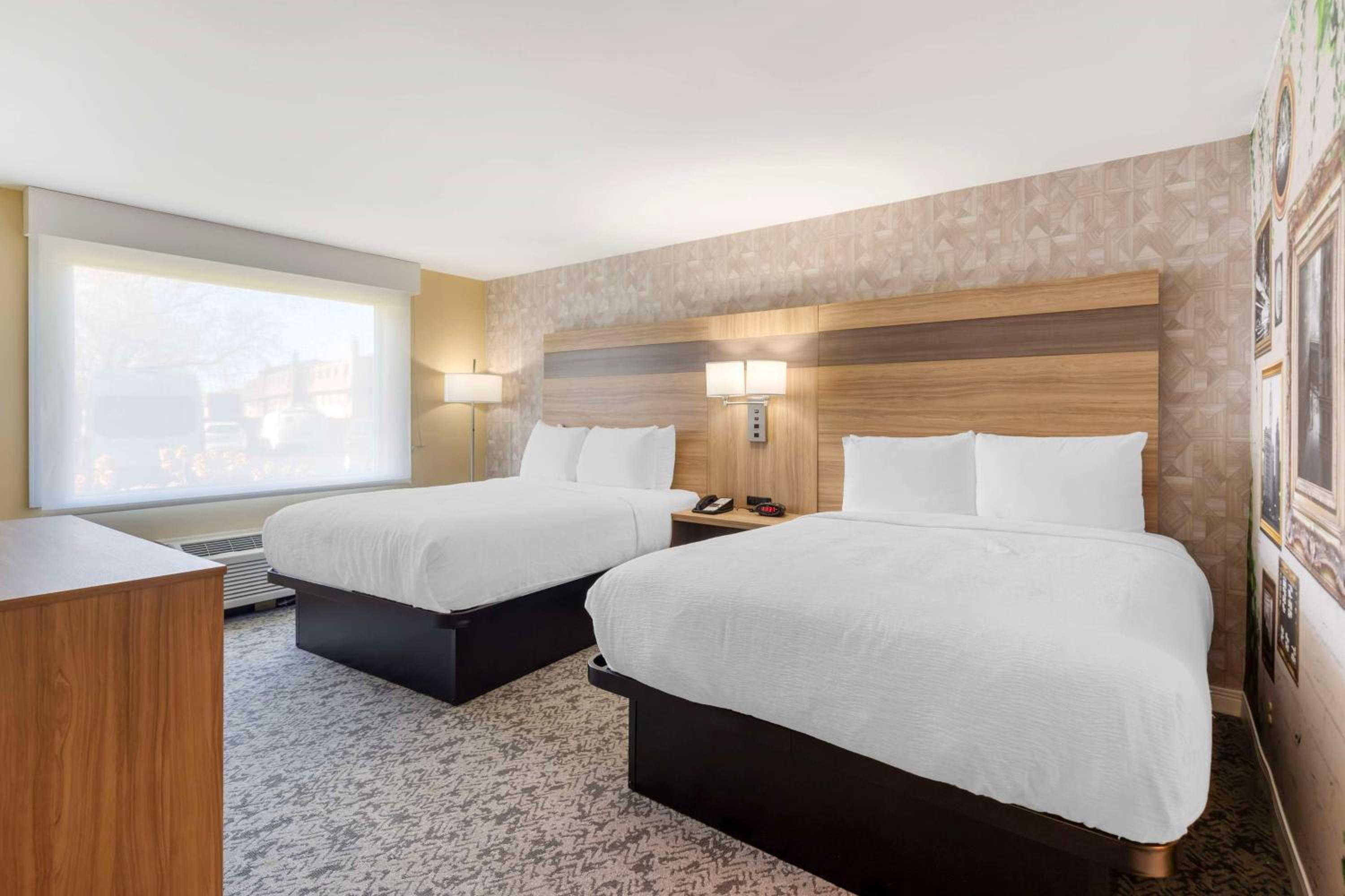 Queen Suite with Two Queen Beds and Sofa Bed - Non-Smoking - Photo 1