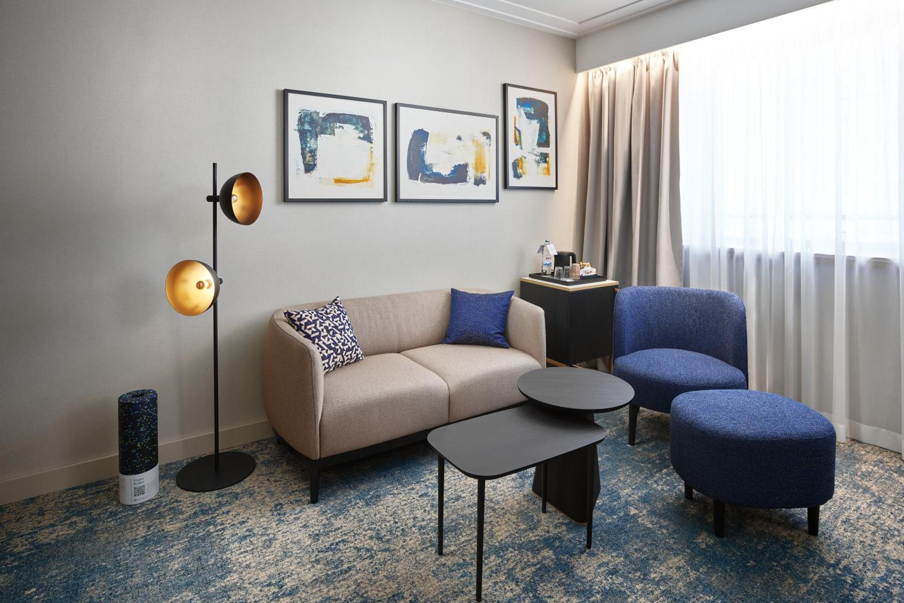 Deluxe Room with Sofa Bed - Photo 1