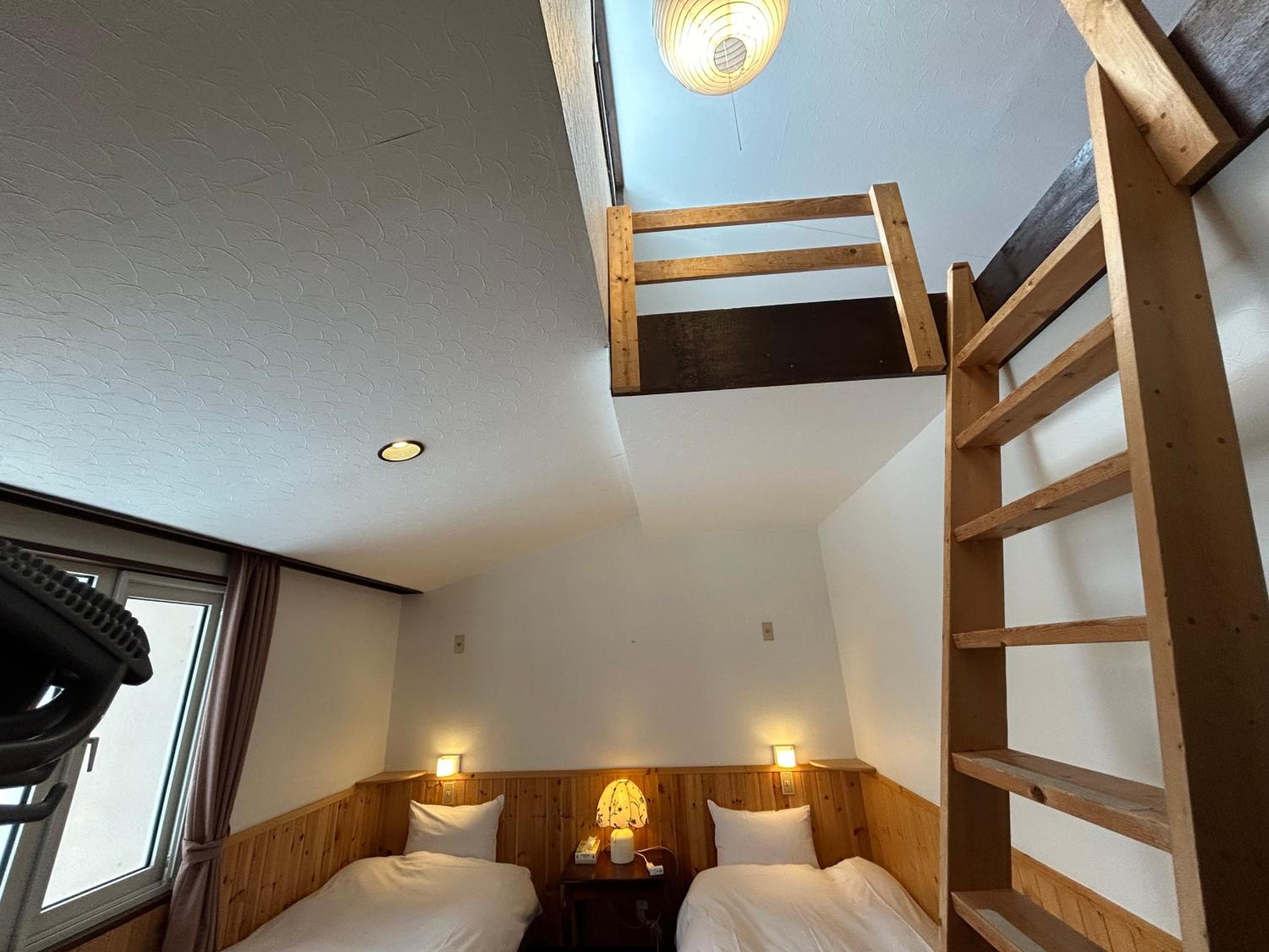 Quadruple Room with Shared Bathroom