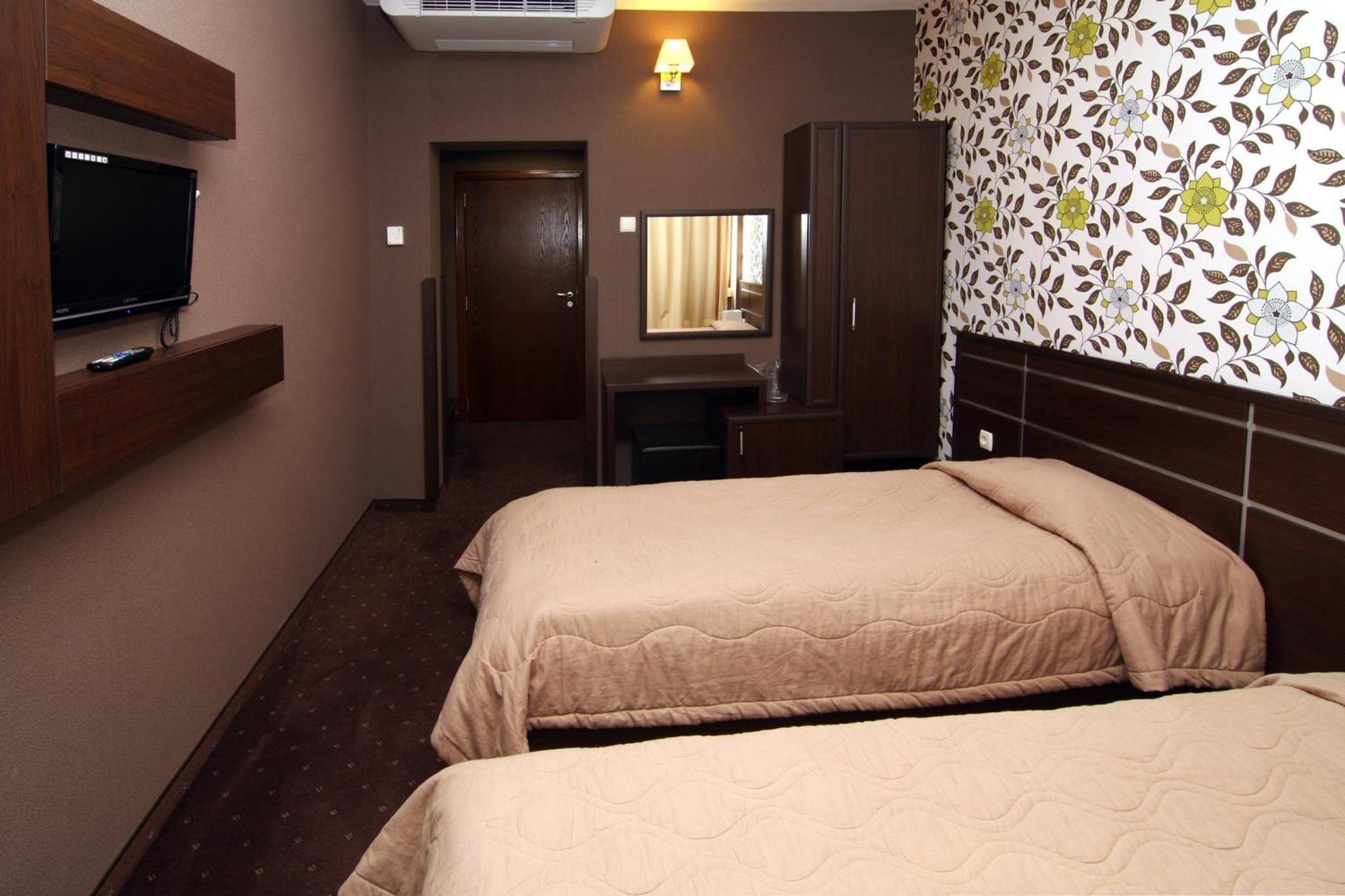 Standard Twin Room - Photo 4