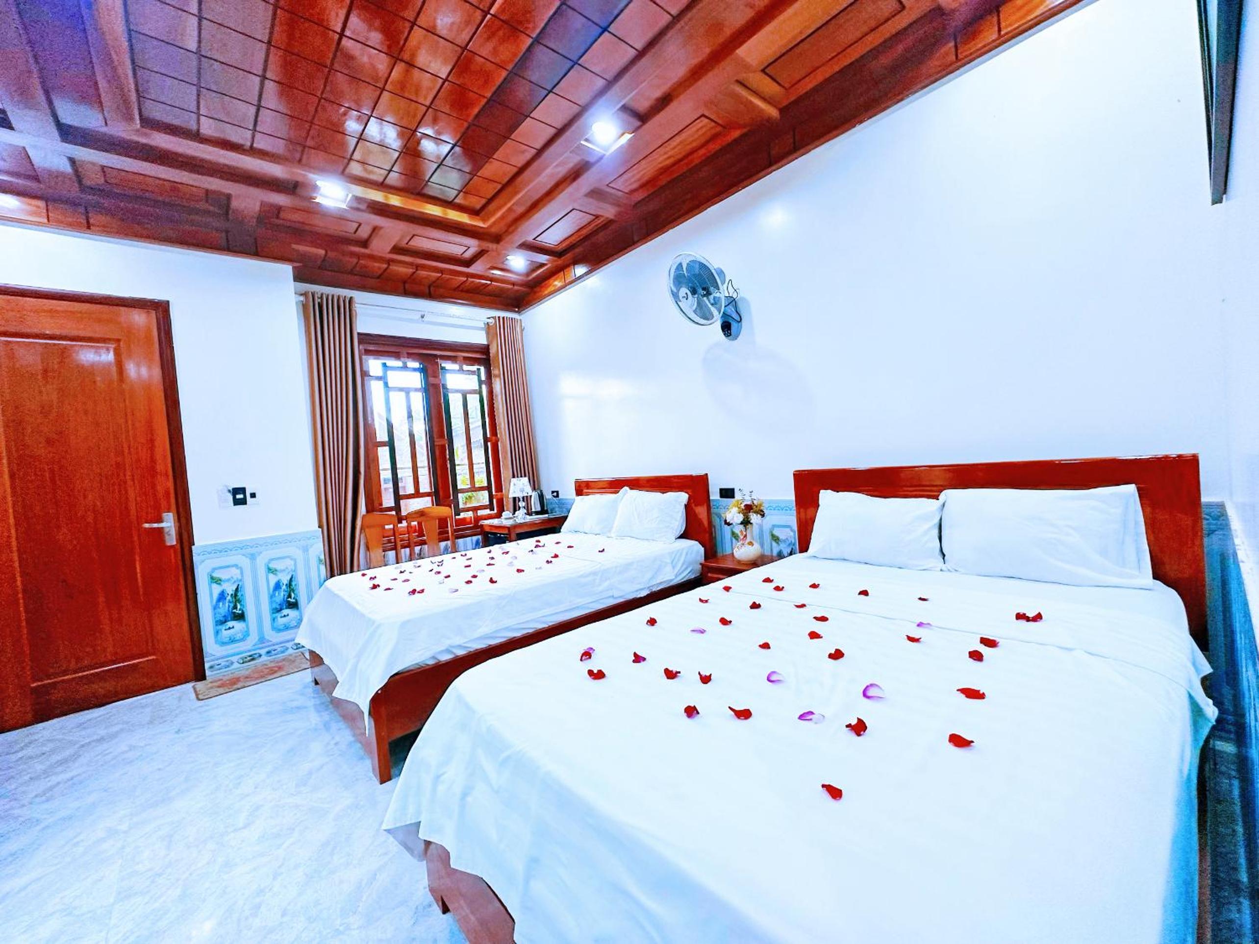 Deluxe Queen Room with Two Queen Beds - Photo 1