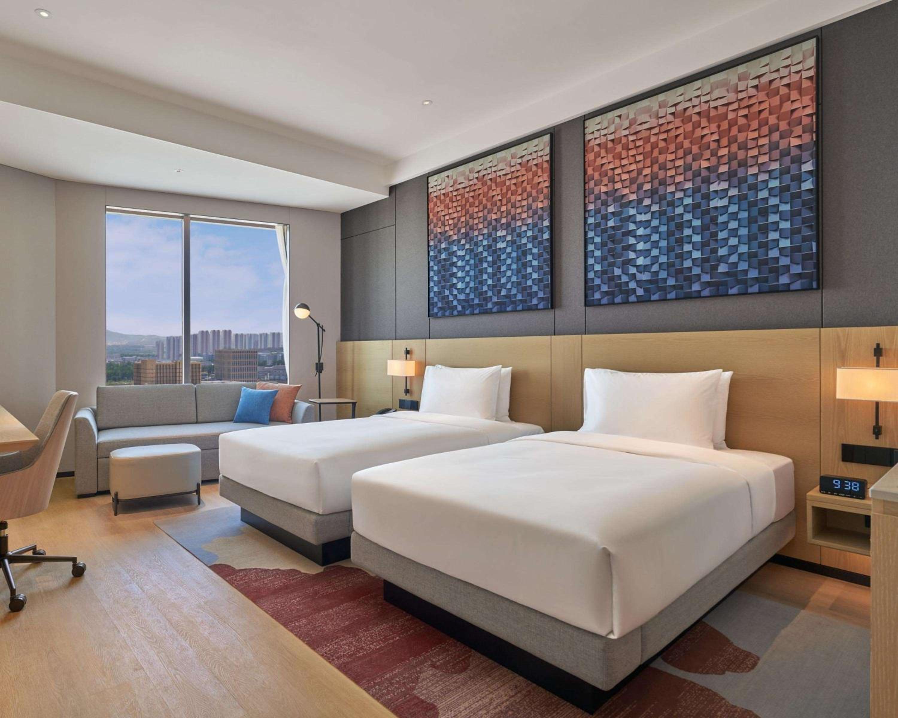 Twin Room with Two Twin Beds and Sofa Bed
