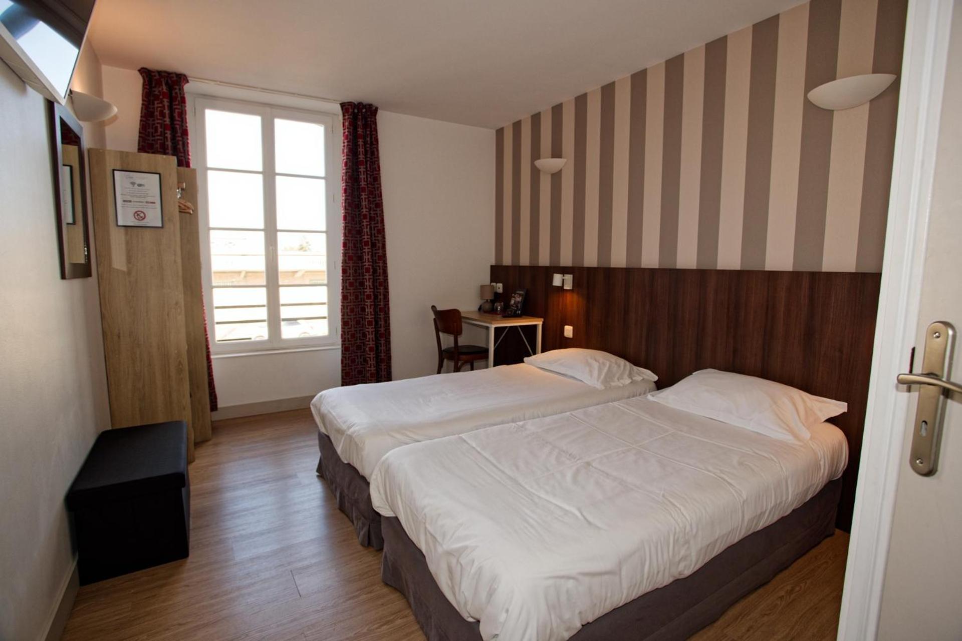 Twin Room - Photo 1
