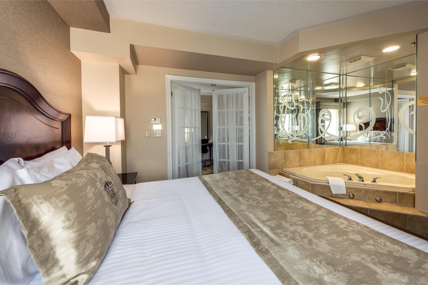 Deluxe King Suite with Jetted Tub and Living Room - Photo 4