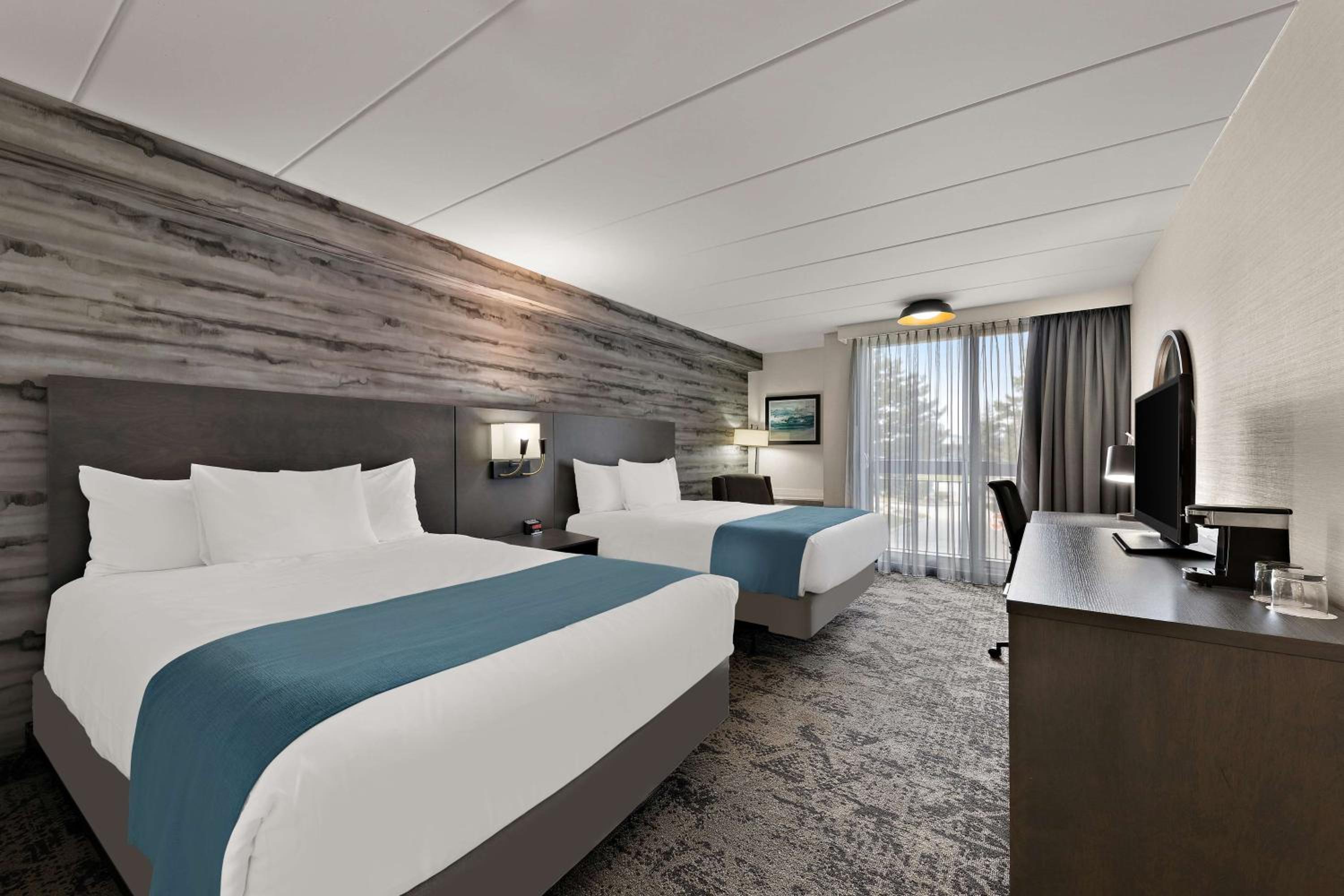 Queen Room with Two Queen Beds and Balcony - Photo 1