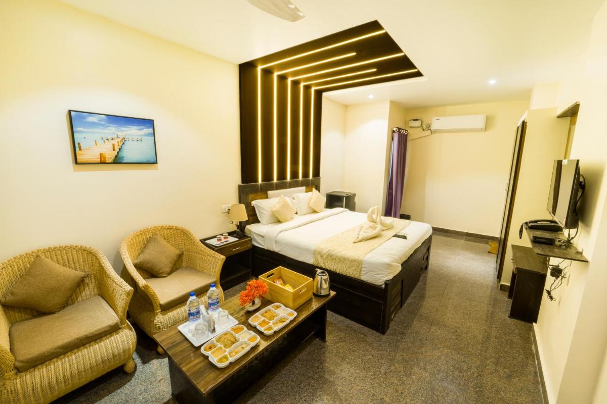 King Suite with Balcony - Photo 1